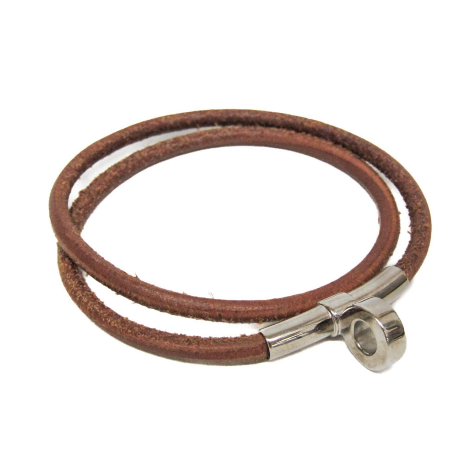 Metal leather bangle Hermes: Metal leather bangle Hermes The Hermes metal leather bangle boasts a rich, brown color and sleek silver accents, adding an air of sophistication to any outfit. Crafted from high-quality leather and