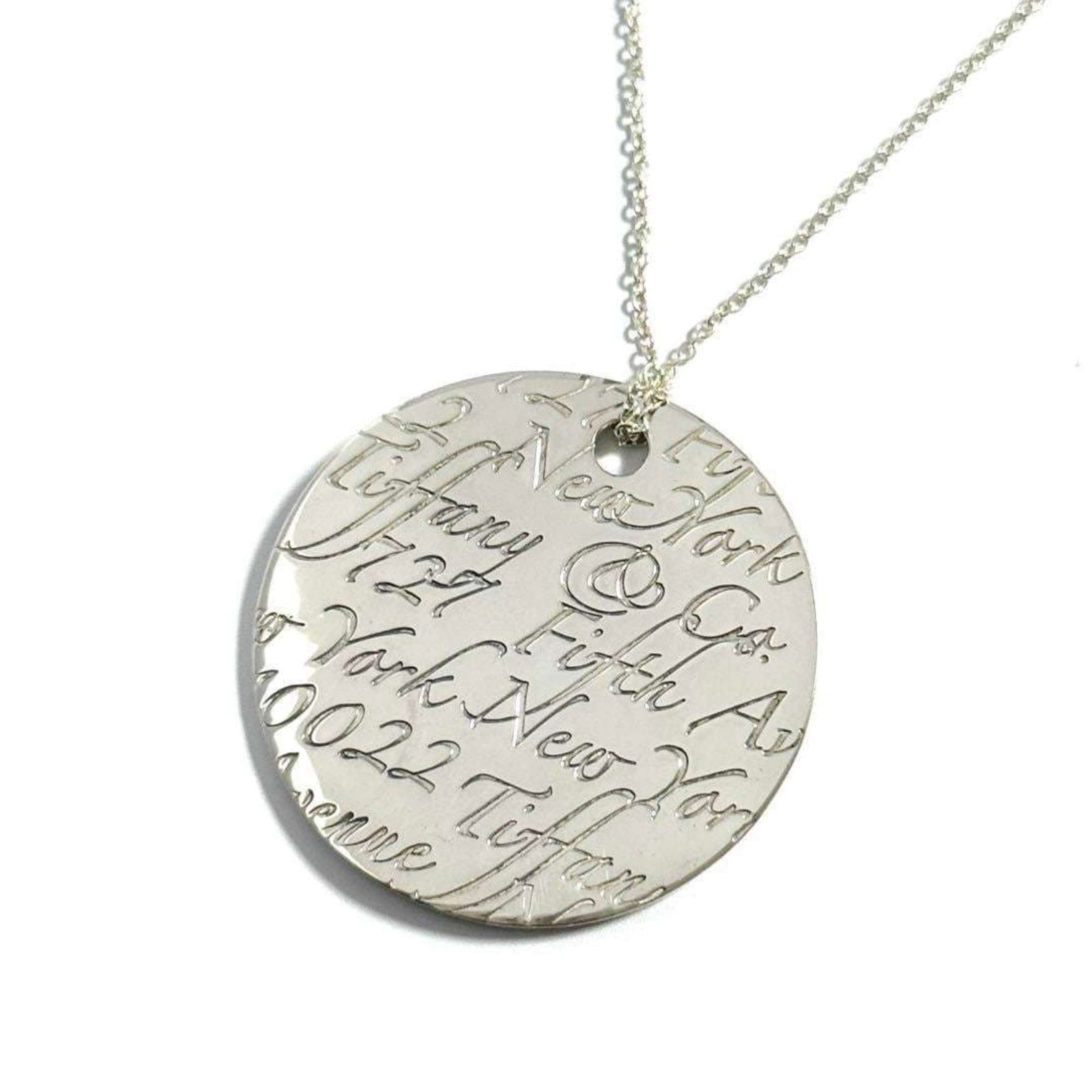 Tiffany Women'S Notes Pendant Necklace: Tiffany Women'S Notes Pendant Necklace Silver 925 Tiffany Women's Notes Pendant Necklace in excellent condition, with some minor scratches and dirt visible. The necklace features a classic design, per