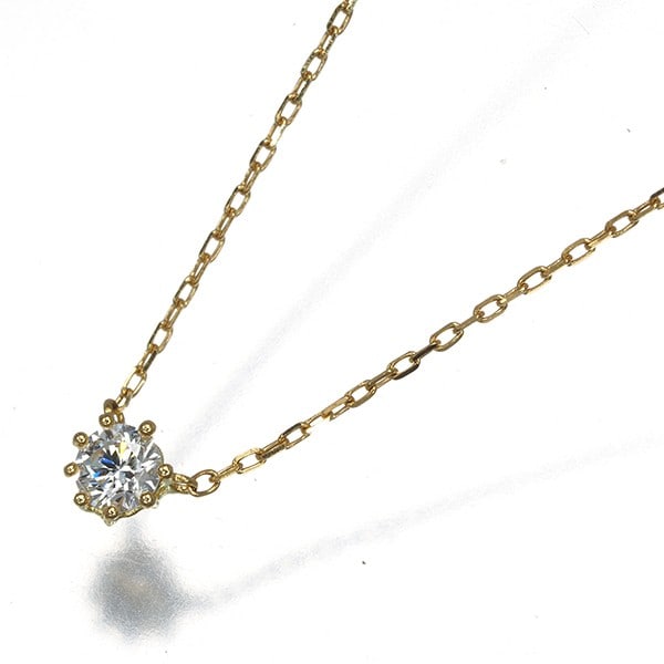 Ahkah Necklace Diamond 0.07Ct Saltier Round Solitaire 18K 750 Yellow Gold: Ahkah Necklace Diamond 0.07Ct Saltier Round Solitaire 18K 750 Yellow Gold The Ahkah Necklace features a stunning 0.07Ct saltier round diamond solitaire set in 18k yellow gold, showcasing the natural