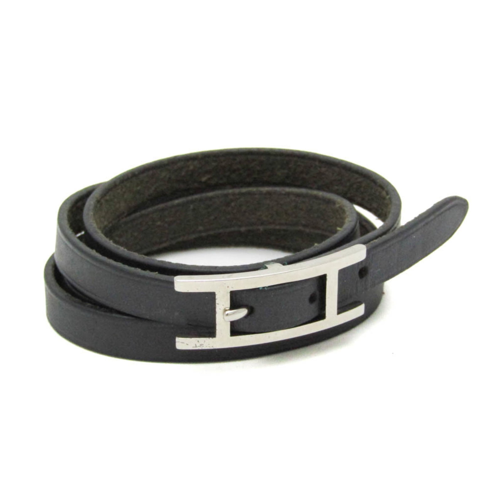 Metal leather bangle Hermes: Metal leather bangle Hermes Metal leather bangle from Hermes, featuring a classic casual design with a black and silver finish. The bangle's leather and metal construction provides a durable and