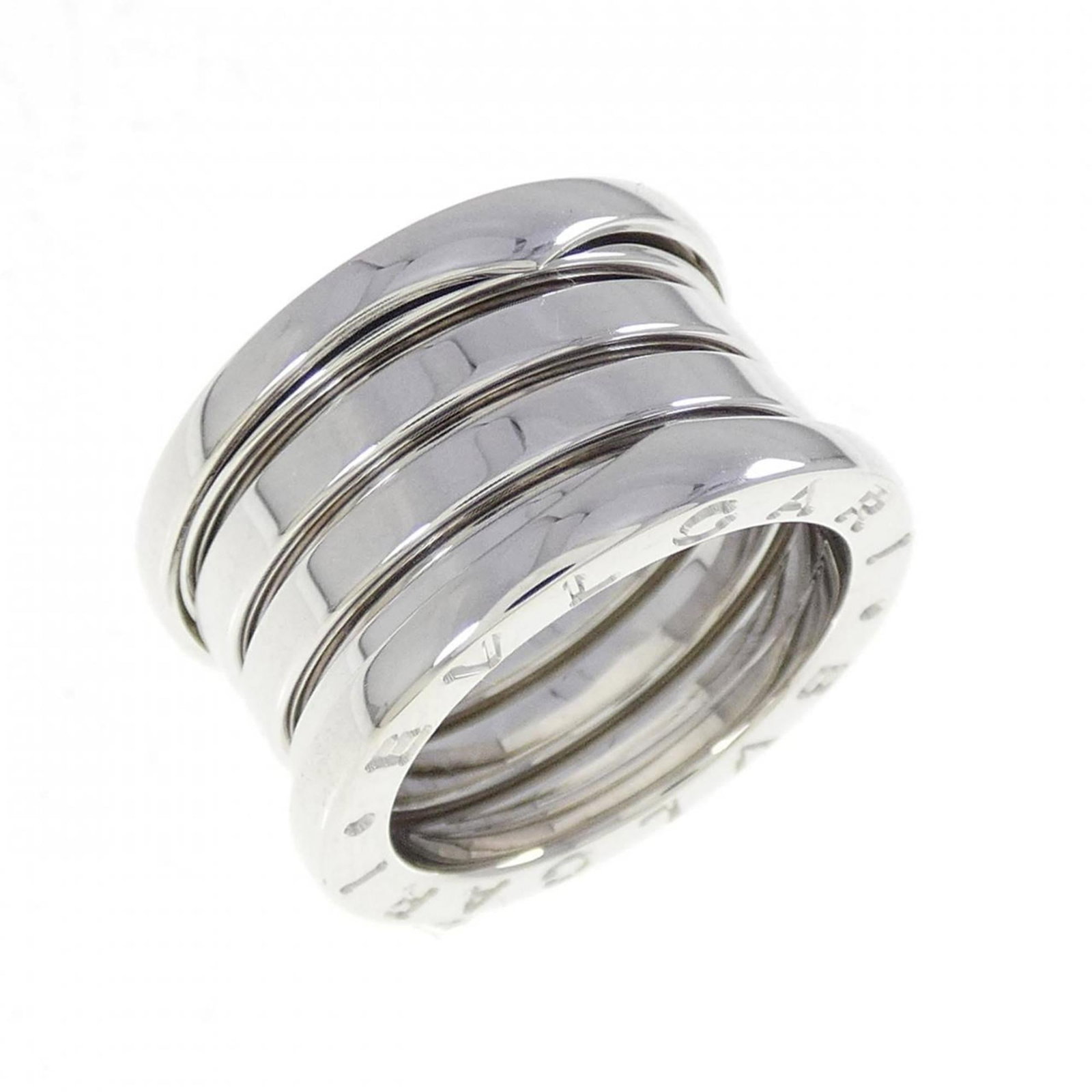 Bvlgari Band Ring White Gold (18K): Bvlgari Band Ring White Gold (18K) 18K White Gold Bvlgari Band Ring for Women, A Timeless Classic.This elegant band ring features a sleek white gold design with an 18K material, measuring 11.8mm in