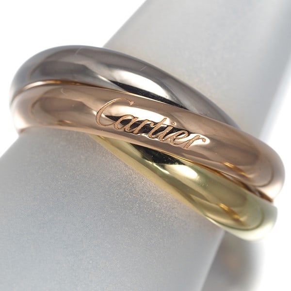 Cartier classic rose gold yellow white 18k trinity ring eu56 3color.: Cartier classic rose gold yellow white 18k trinity ring eu56 3color. Cartier's classic rose gold yellow white 18k trinity ring boasts a multi-tone gold design, making it a standout piece. This