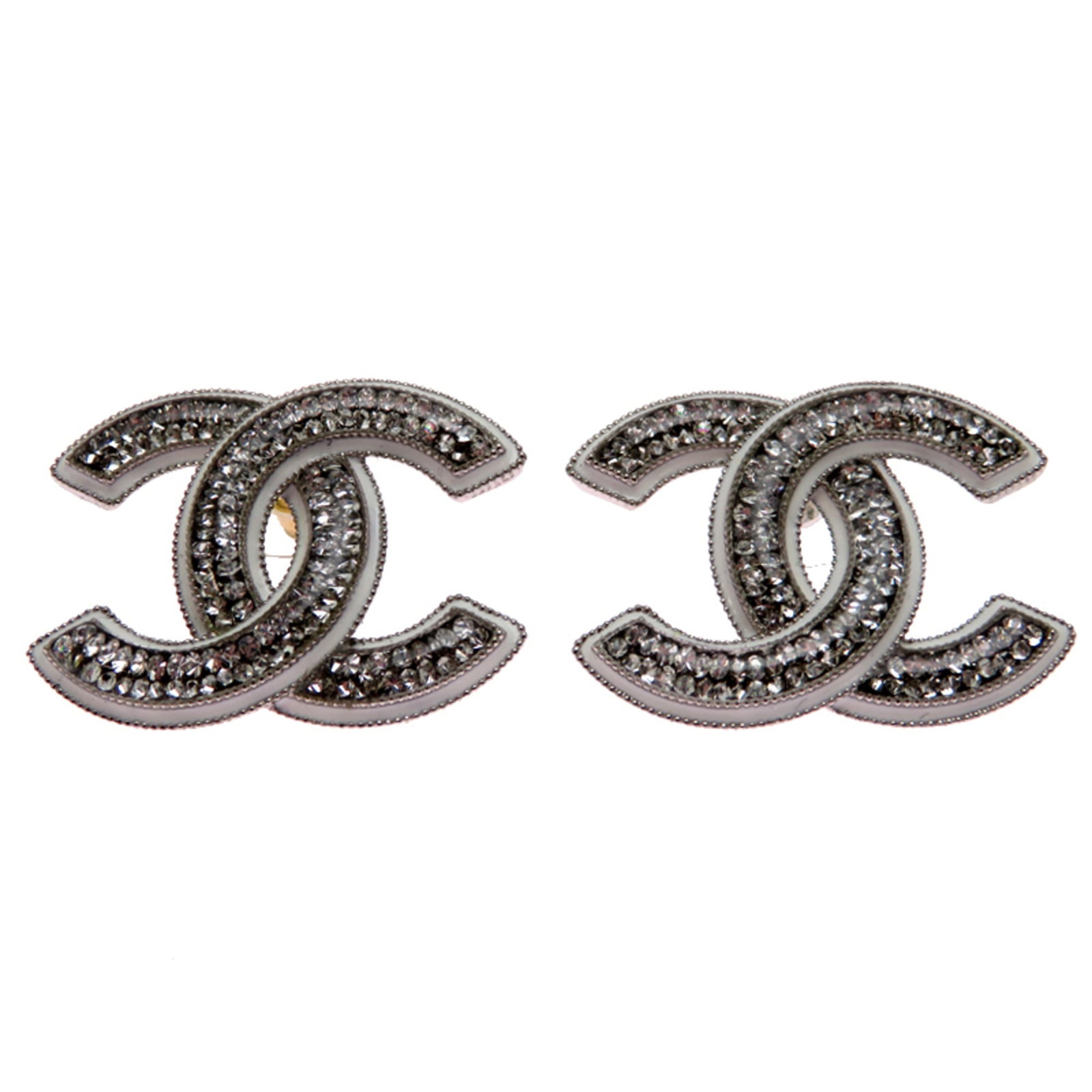 Stud Earrings Metal by Chanel: Stud Earrings Metal by Chanel Stud earrings by Chanel, crafted from metal, feature a sleek design with a subtle presence. Measuring 25mm x 31.90mm, these earrings showcase the iconic brand's attention