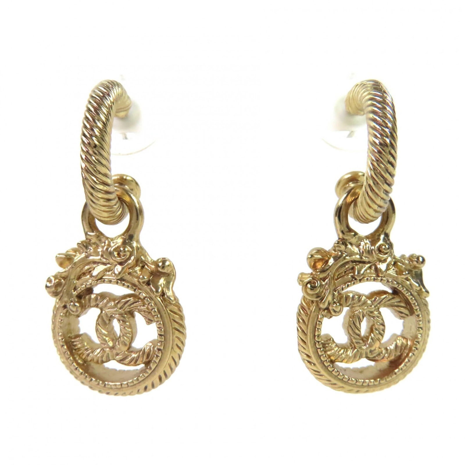 Chanel Stud Earrings: Chanel Stud Earrings Stud earrings in gold, measuring 2.00mm x 1.70mm, bearing the Chanel brand and in mint condition like new. The earrings are a classic design with a subtle stud style that adds a t