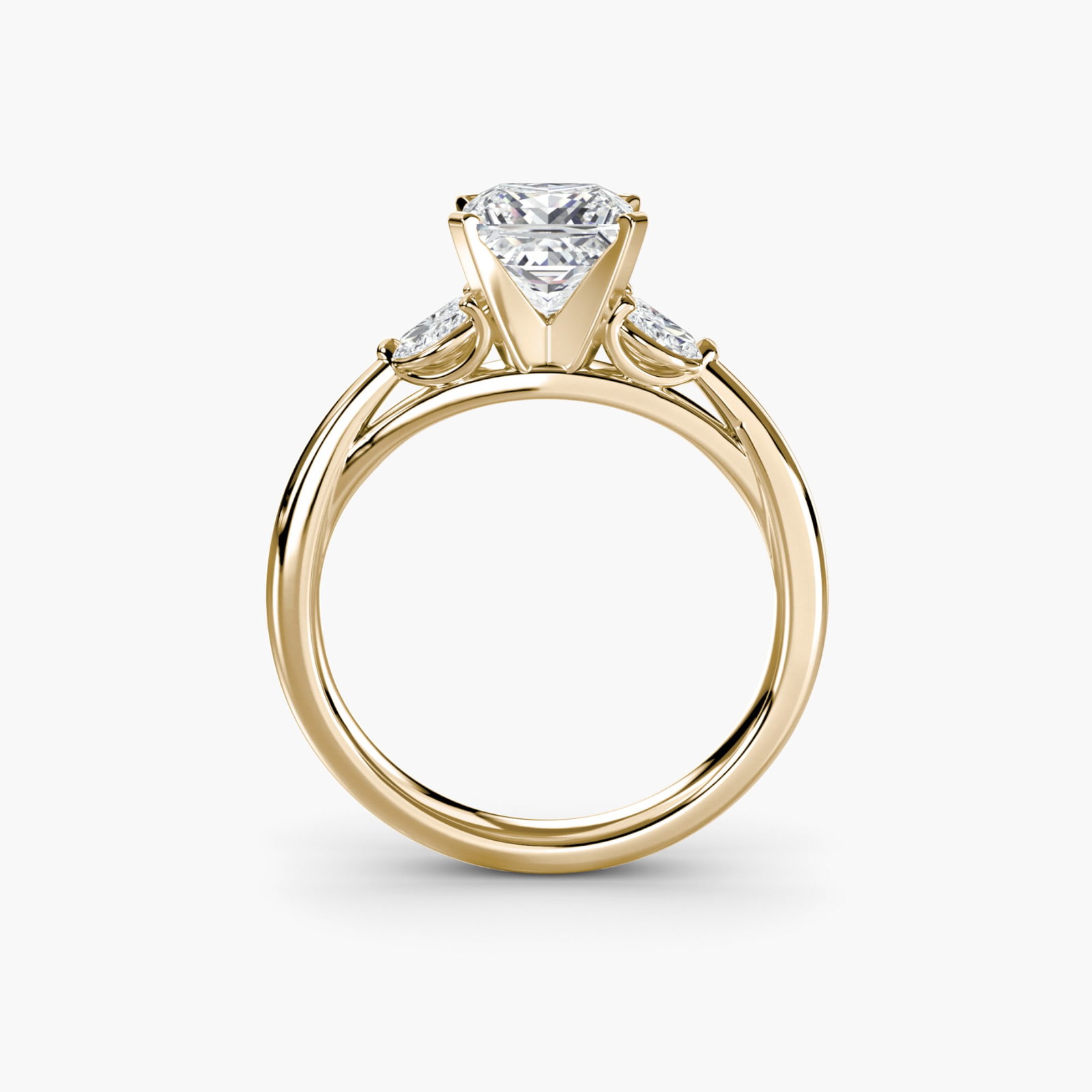 Side Stone Princess 14Kt Yellow Gold Ring Setting: Side Stone Princess 14Kt Yellow Gold Ring Setting Side stone princess ring setting in 14Kt yellow gold, featuring four lab-grown side stones totaling 0.43 carats and a band width of 2.3mm. This new