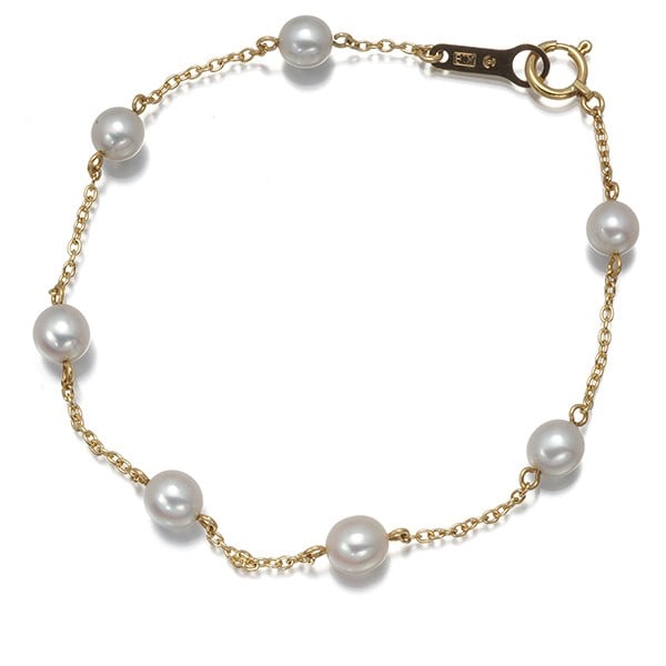 Yellow Gold Station 750 5.0Mm Akoya Pearl Bracelet: Yellow Gold Station 750 5.0Mm Akoya Pearl Bracelet Yellow Gold Station 750 5.0Mm Akoya Pearl Bracelet features 18k yellow gold metal, adorned with cultured akoya pearls in a station style design. The