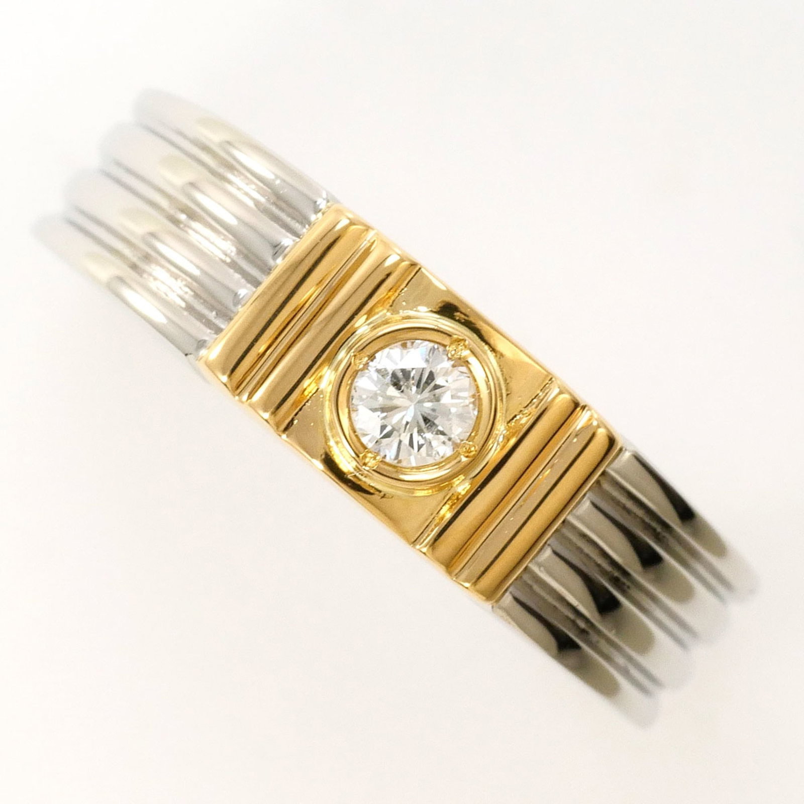 Unbranded Band Ring Platinum 900 Yellow Gold (18K): Unbranded Band Ring Platinum 900 Yellow Gold (18K) Platinum 900 Yellow Gold (18K) band ring features a diamond stone weighing 0.10 carats in a 6 us size, with a width of 5mm and a weight of 4.5g. Made