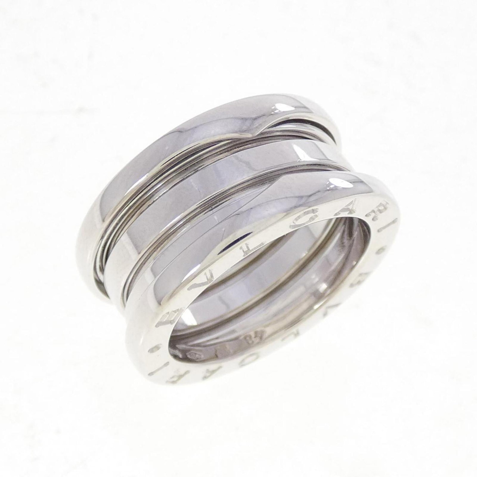 Bvlgari Band Ring White Gold (18K): Bvlgari Band Ring White Gold (18K) Bvlgari Band Ring White Gold (18K) features a sleek and sophisticated design, crafted from high-quality white gold. The ring boasts a classic band style that exudes