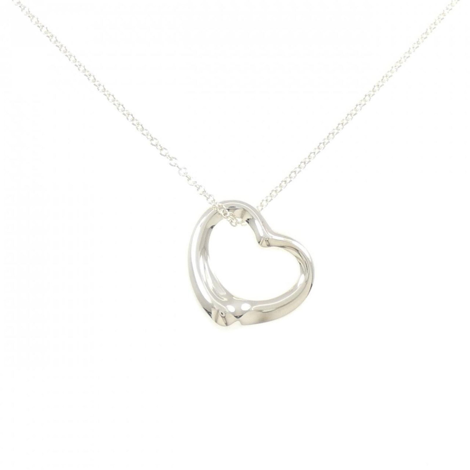 Heart Open Tiffany Necklace: Heart Open Tiffany Necklace The Heart Open Tiffany Necklace boasts a sleek silver design with intricate details, measuring 21.3mm x 21mm in size and weighing 7.1g. Its 41 cm / 16.14'' adjustable neck 