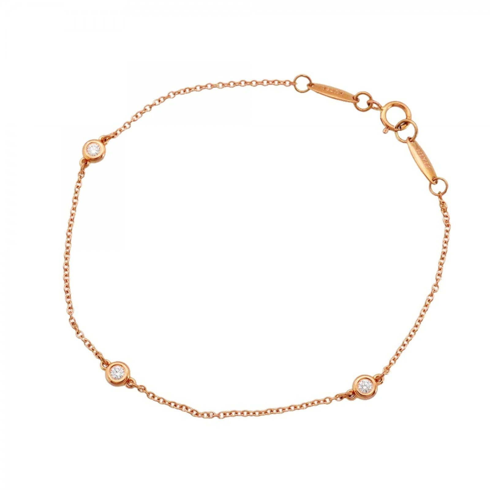 Pink Gold 18K Tiffany Charm Bracelet: Pink Gold 18K Tiffany Charm Bracelet Pink Gold 18K Tiffany Charm Bracelet. This 17.5cm long charm bracelet features pink gold (18K) and a diamond stone, with traces of usage and minor scratches visibl