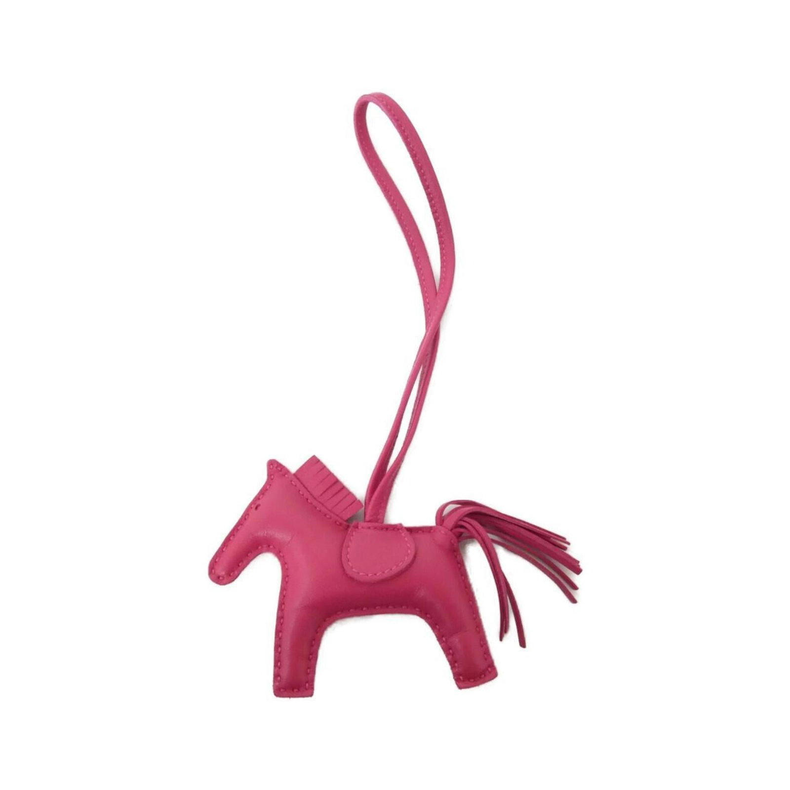 Hermes Handbag Charm Agneau Milo: Hermes Handbag Charm Agneau Milo Agneau Milo charm from Hermes, featuring a pink color and a unique design. This handbag charm measures 70mm x 80mm and comes with a 360mm chain length, making it a sty