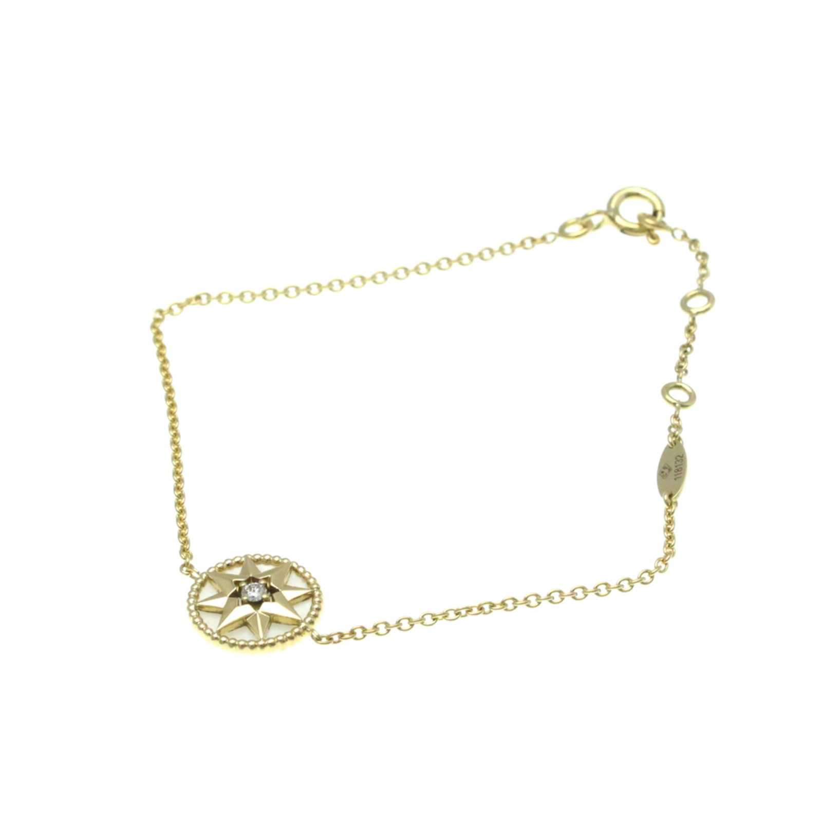 Christian Dior Charm Yellow Gold 18K Bracelet: Christian Dior Charm Yellow Gold 18K Bracelet Yellow Gold 18K Charm Bracelet from Christian Dior. This fashion bracelet features diamond and mother of pearl stones set in 18K yellow gold, with a lengt