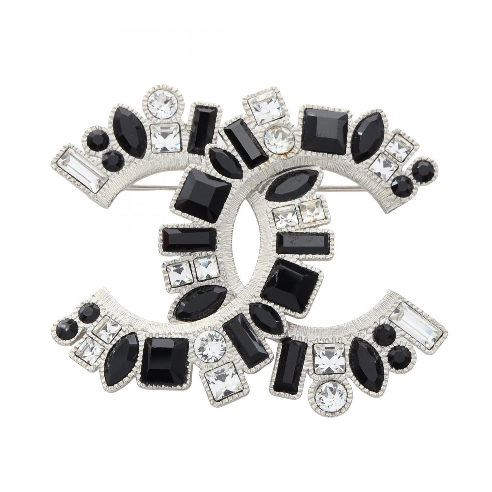 Chanel rhinestone stainless steel brooch: Chanel rhinestone stainless steel brooch This Chanel rhinestone stainless steel brooch features intricate details and a luxurious finish, with a striking combination of black, clear, and silver hues.
