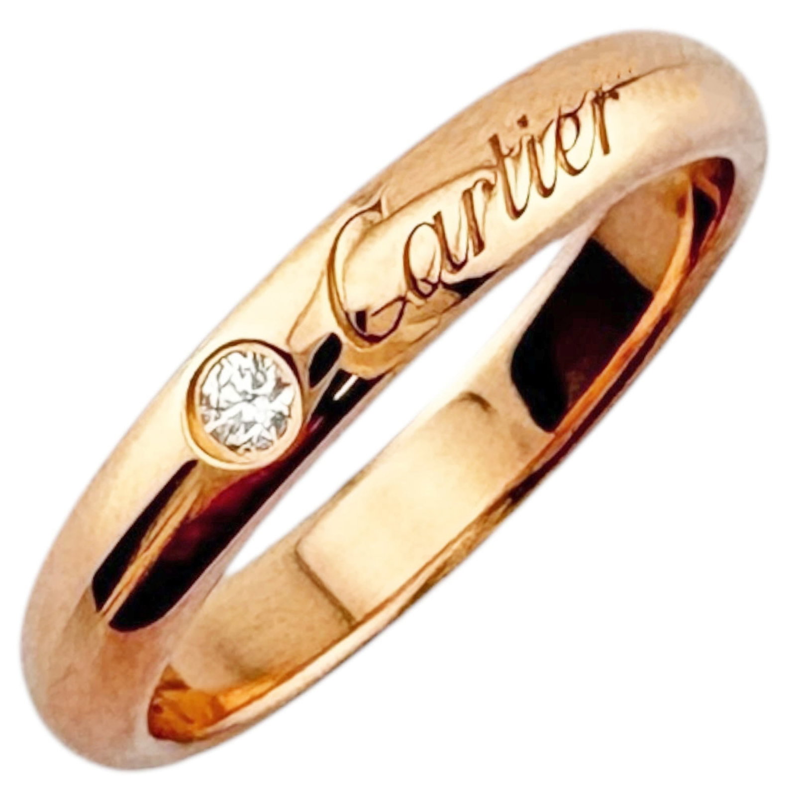 Pink gold 18k ring band from Cartier: Pink gold 18k ring band from Cartier Pink gold 18k ring band from Cartier, featuring a beautiful pink gold material and a classic design. This used item is in like new condition with hardly any