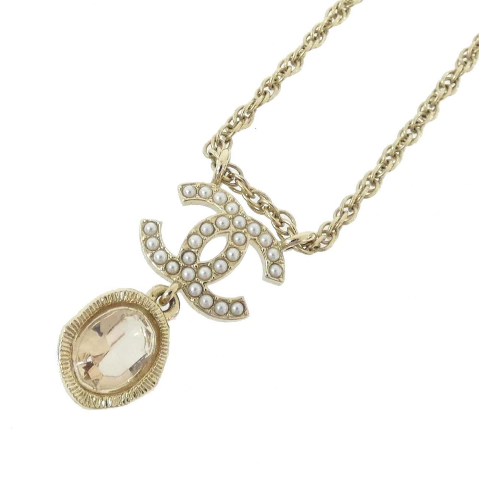 Ab6815 Chanel Necklace: Ab6815 Chanel Necklace Gold and crystal Chanel necklace with a 27mm x 16mm pendant, suitable for women. The necklace features a gold chain with a white stone crystal pendant, available in sizes 39 cm