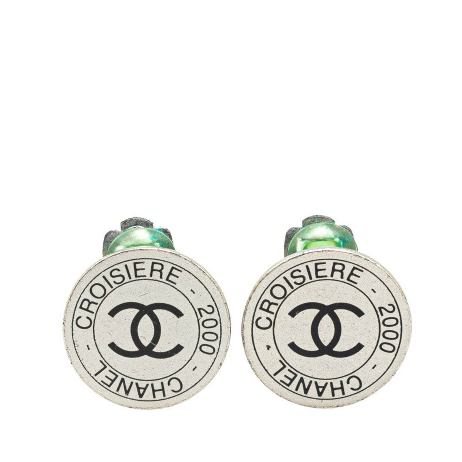 Clip earrings metal by Chanel: Clip earrings metal by Chanel Clip earrings by Chanel in silver metal, bearing traces of usage and minor scratches. The item measures 20.50mm x 20.50mm and has been used but remains in good condition.