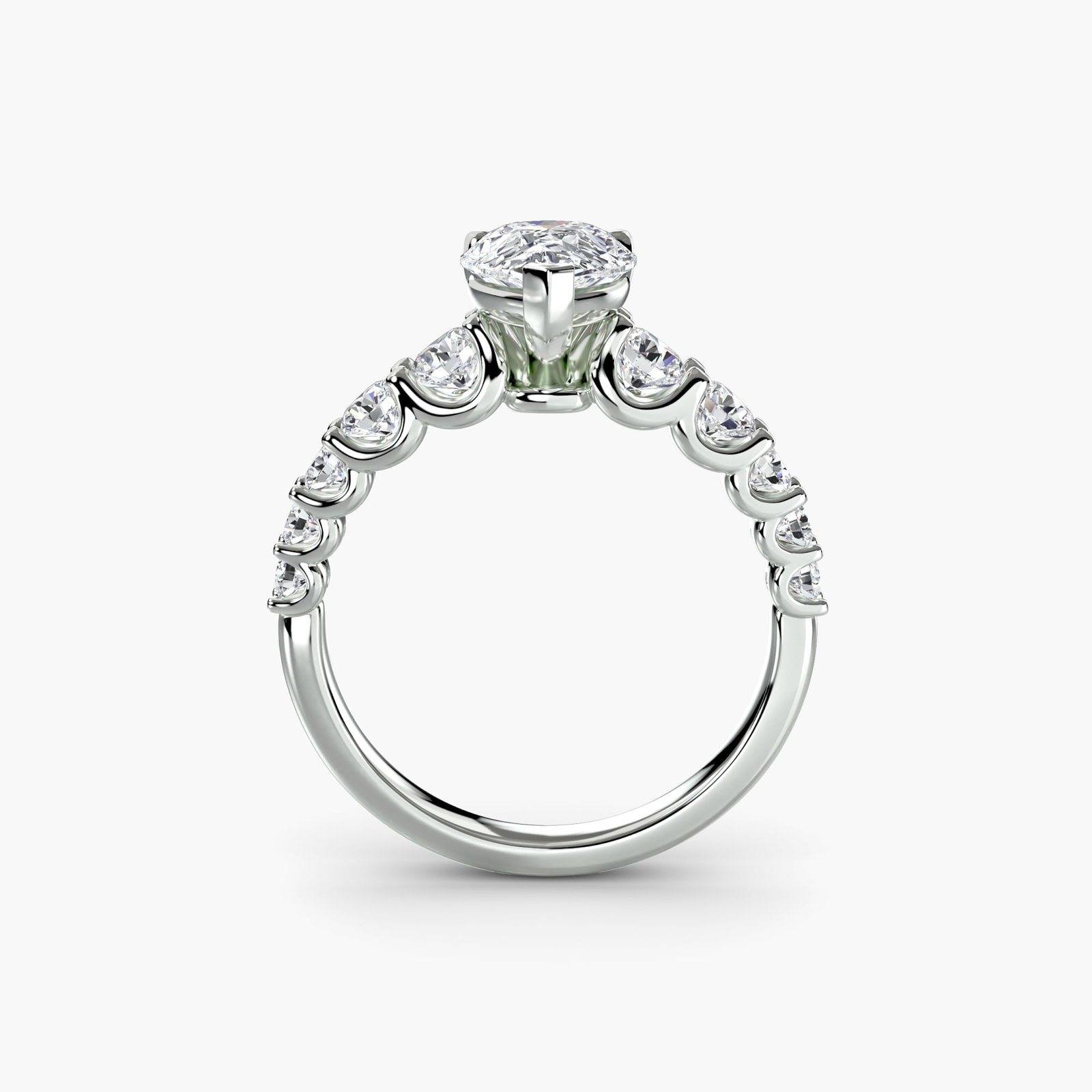 Side Stone Pear 18Kt White Gold Ring Setting: Side Stone Pear 18Kt White Gold Ring Setting 18Kt White Gold Pear Ring Setting with 10 Side Stones. This elegant ring features a pear-shaped setting with a total carat weight of side stones ranging fr