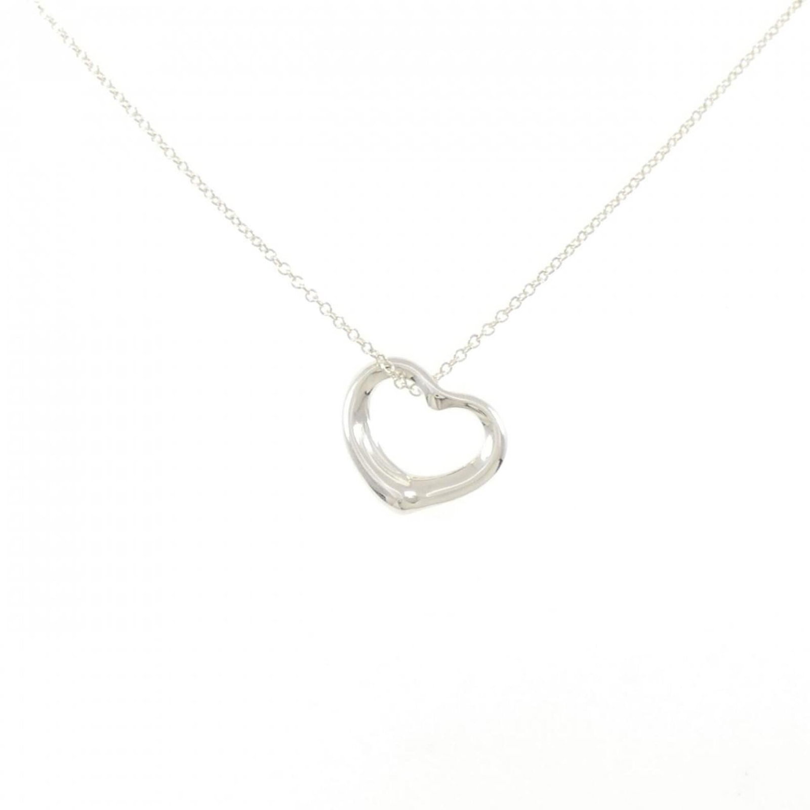 Heart Open Tiffany Necklace: Heart Open Tiffany Necklace The Heart Open Tiffany Necklace boasts a sleek silver design, measuring 14mm x 14mm. Its 41cm chain circumference provides a comfortable fit for women. With some minor sign