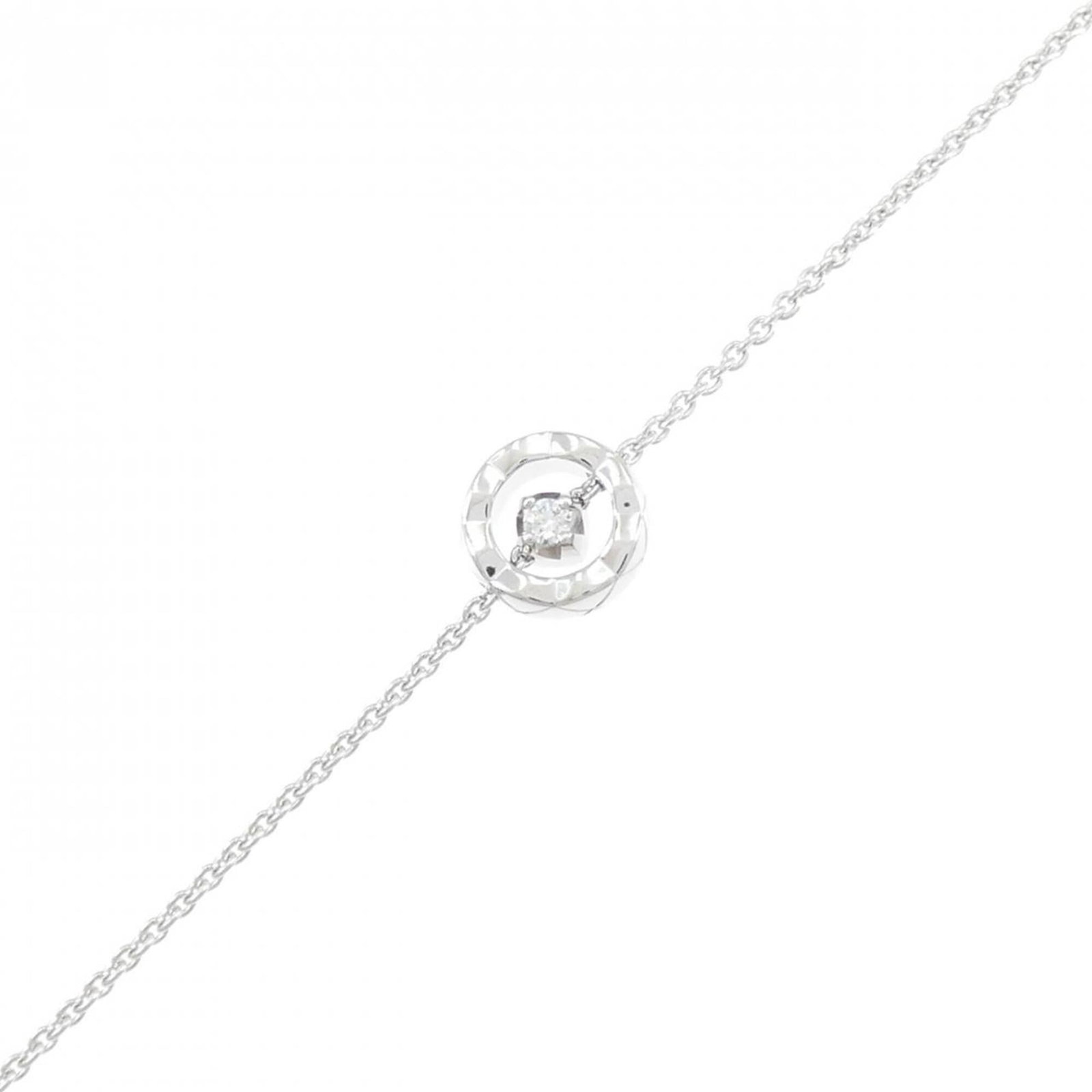 White gold charm bracelet by Chanel: White gold charm bracelet by Chanel Chanel's iconic charm bracelet in white gold, featuring a diamond stone, is a timeless piece for the modern woman. With its elegant design and subtle wear, this 15c