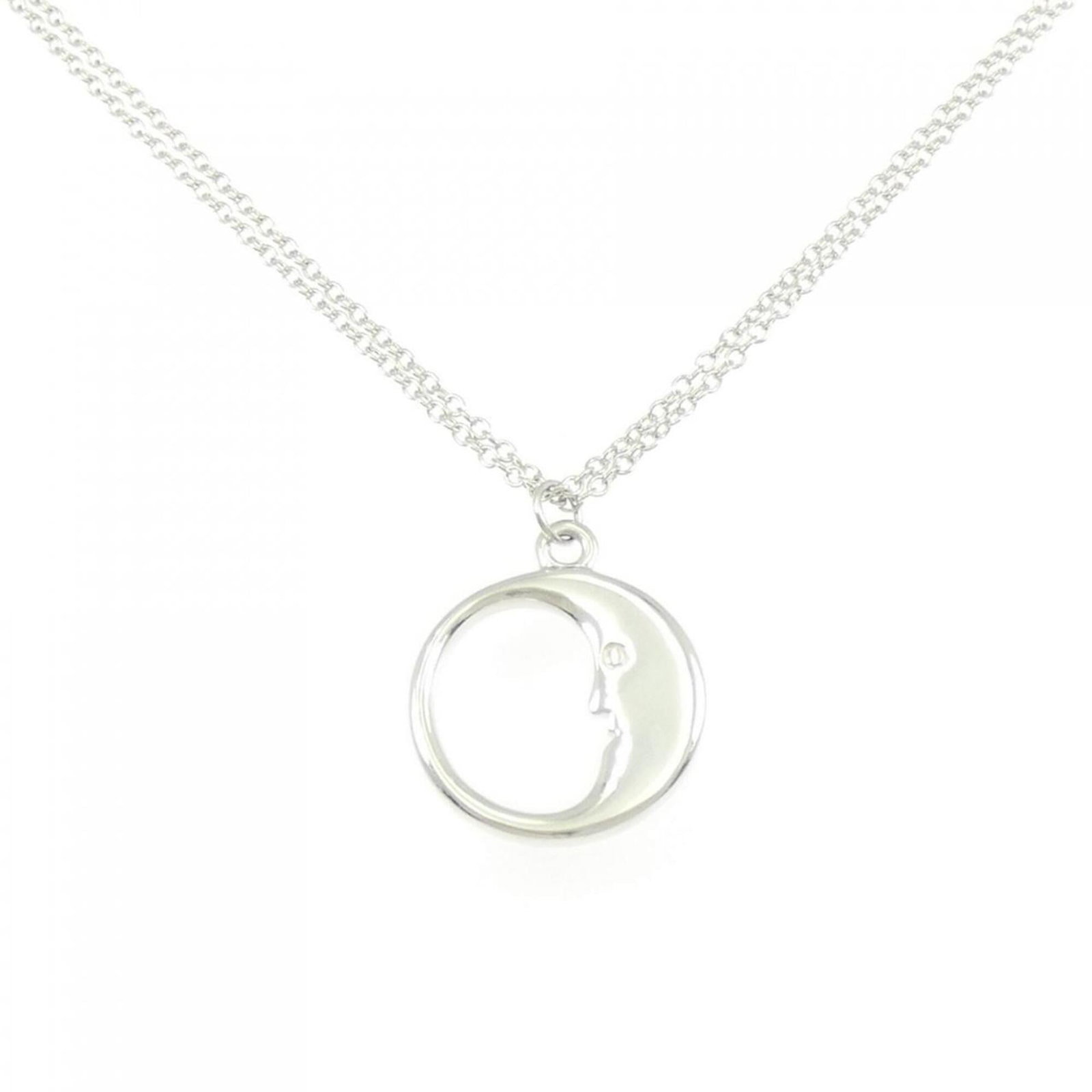 Tiffany Moon Necklace: Tiffany Moon Necklace Tiffany Moon Necklace - A Timeless Silver Pendant. This sterling silver necklace features a beautiful moon pendant, measuring 27.5mm x 23.4mm, set against a chain with a 41 cm / 