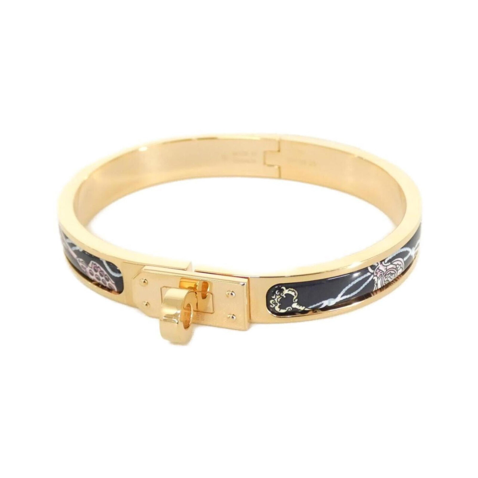 Charm Bracelet by Hermes: Charm Bracelet by Hermes This blue charm bracelet from Hermes features a few traces of usage, some scratches and dirt, but overall remains in very good condition. Measuring 16cm in length, it
