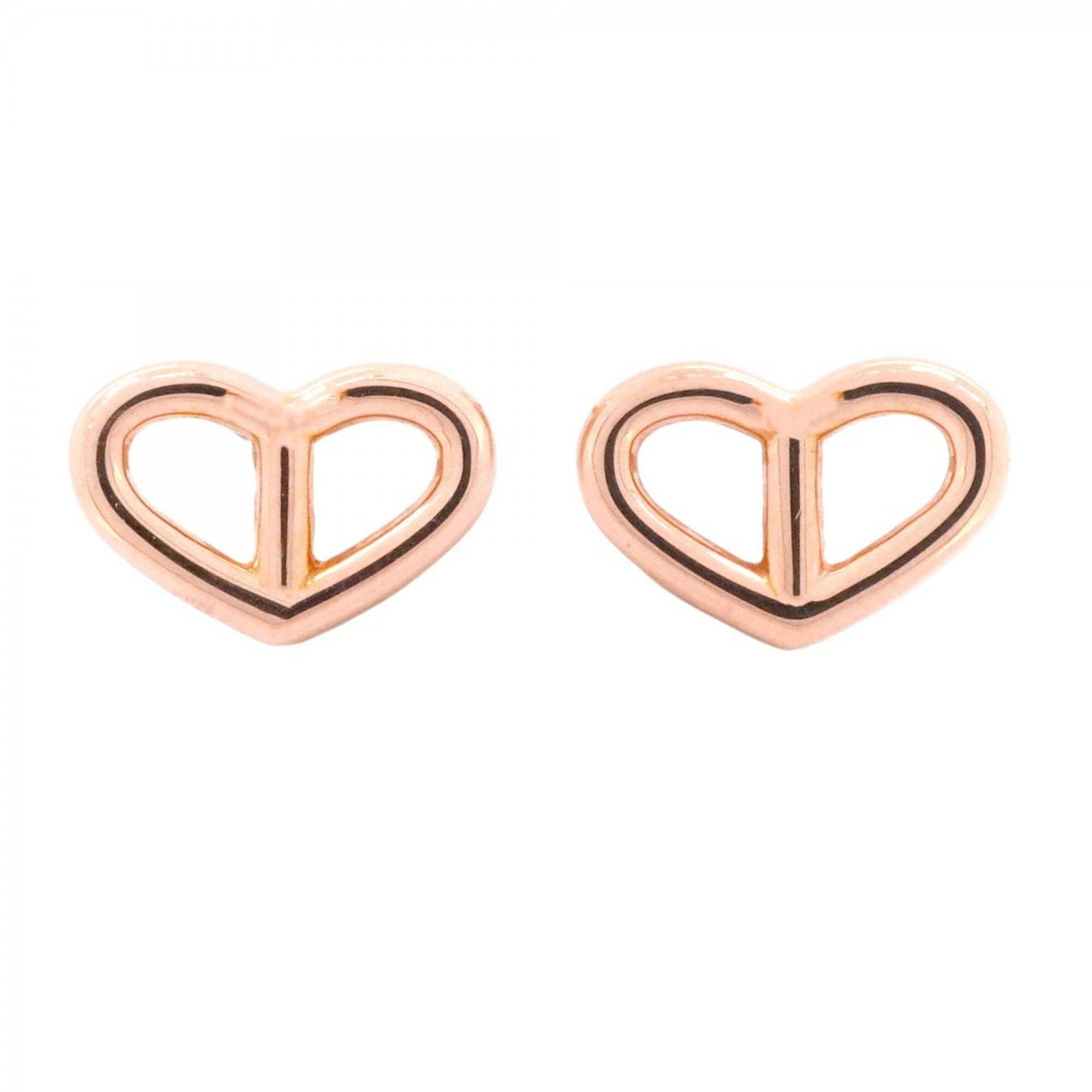 Hermes Stud Earrings Pink Gold (18K): Hermes Stud Earrings Pink Gold (18K) Pink Gold (18K) stud earrings from Hermes, bearing traces of usage and minor scratches. The delicate design showcases the luxury of pink gold in a subtle yet