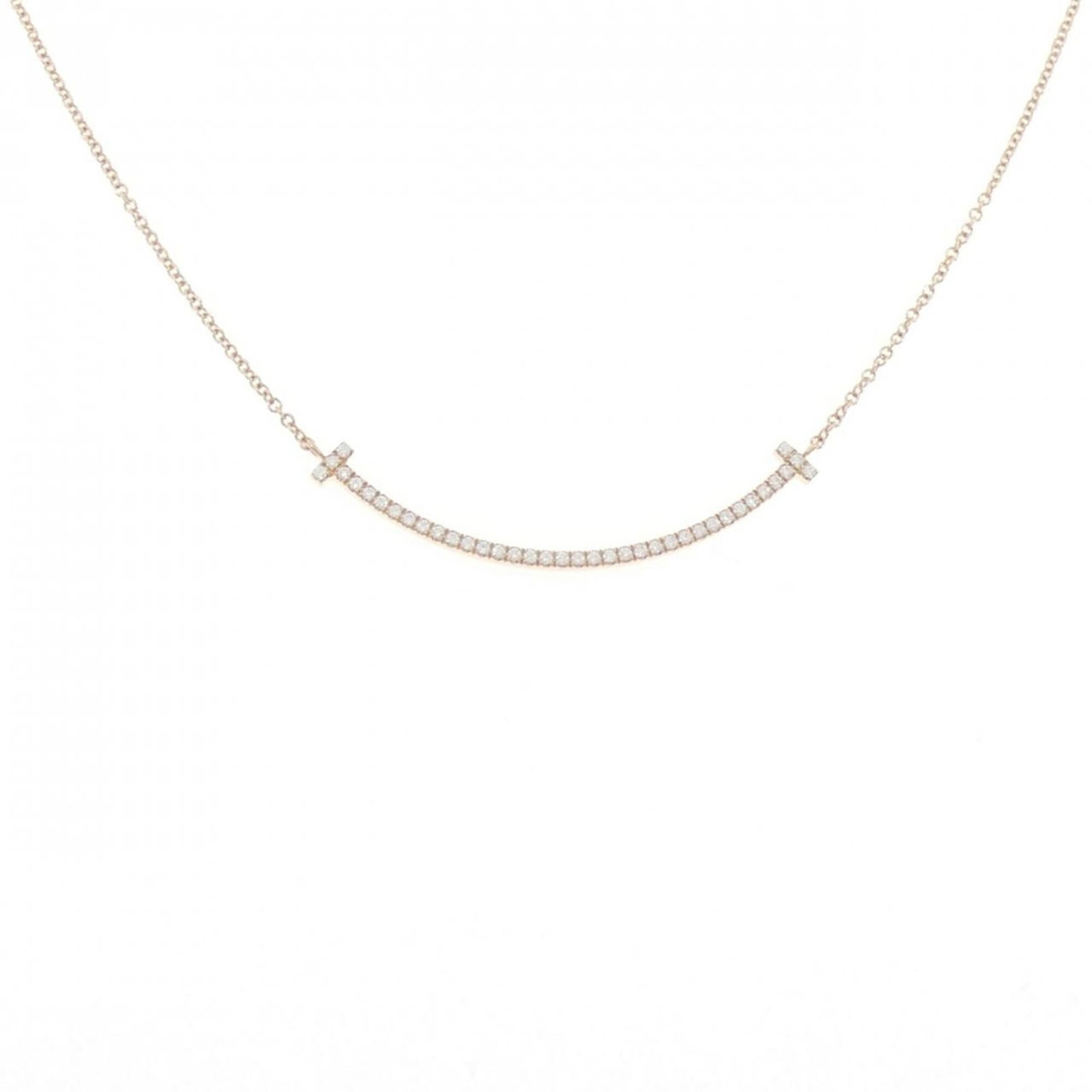 Smile of Tiffany T Necklace Small: Smile of Tiffany T Necklace Small Pink Gold (18K) Tiffany Necklace Type Pendant features a 3.5mm x 37.2mm diamond pendant on a 41 cm / 16.14'' chain, showcasing a classic design with subtle scratches 