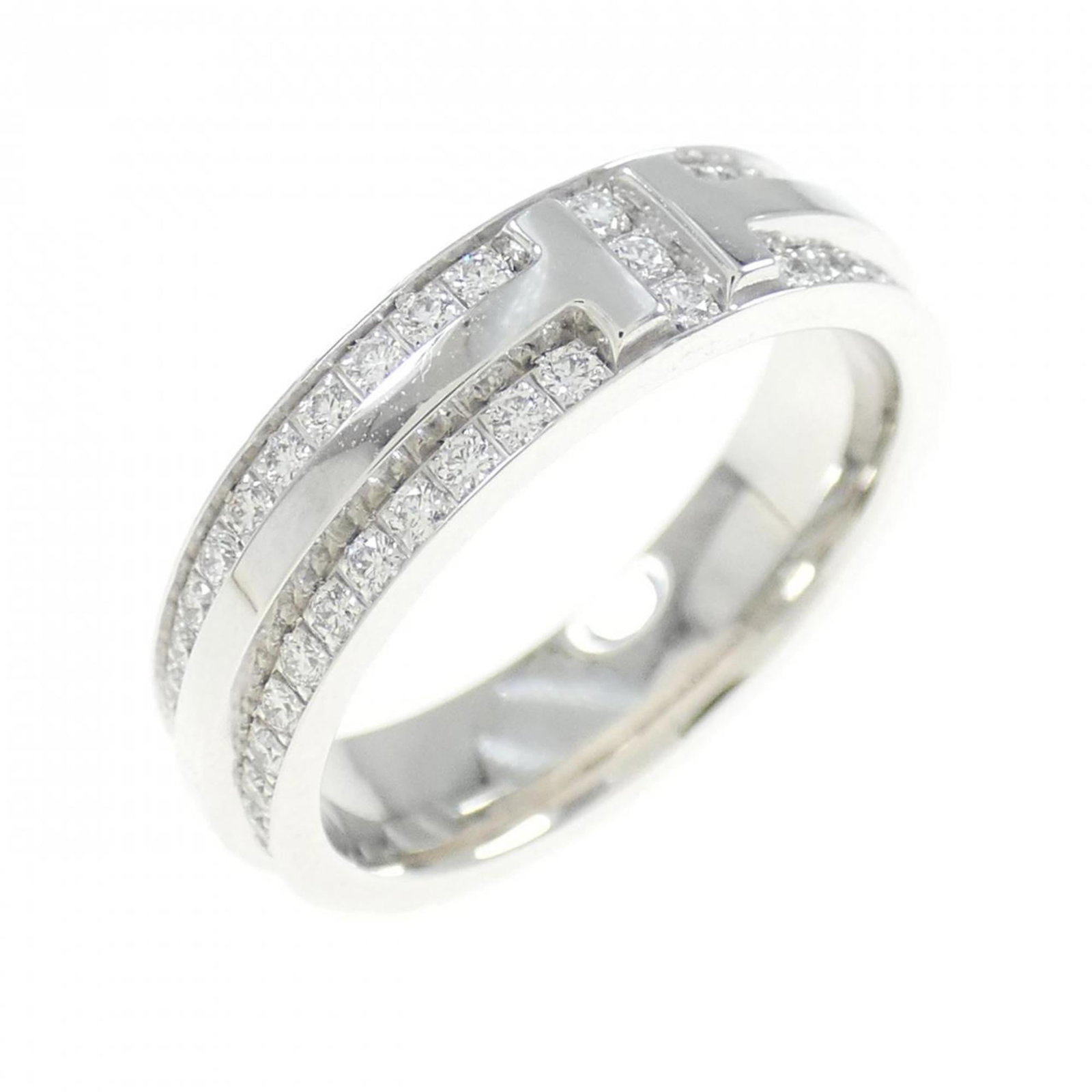 Tiffany Band Ring White Gold (18K): Tiffany Band Ring White Gold (18K) 18K White Gold Tiffany Band Ring with Diamond Stone. A few traces of usage can be seen, and some scratches/dirt are present, but overall in very good condition. This