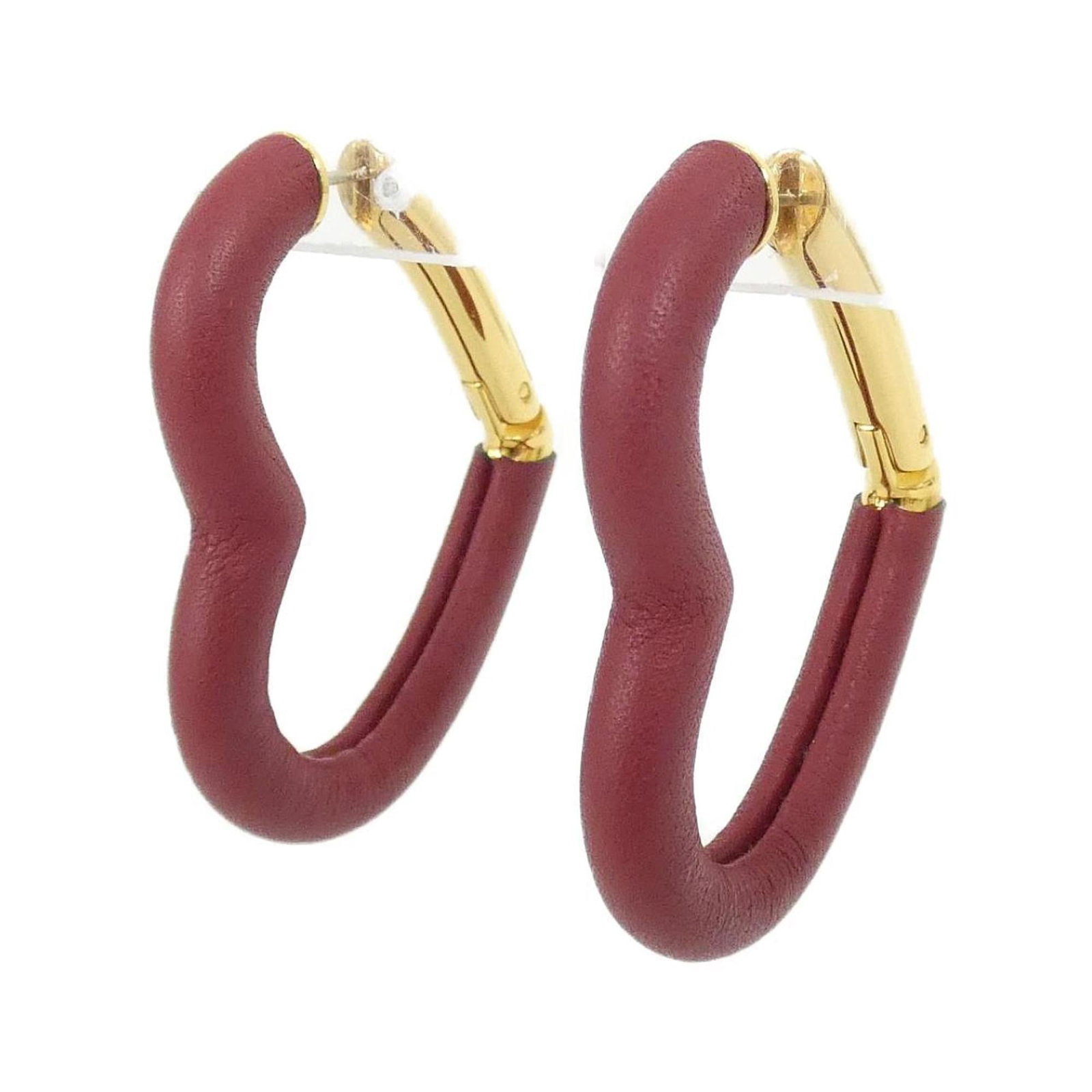 Swift Hermes Leather Stud Earrings: Swift Hermes Leather Stud Earrings Swift Hermes Leather Stud Earrings are crafted from high-quality Swift leather in a bold Rouge Grenat color. With a sleek, understated design and subtle stud details