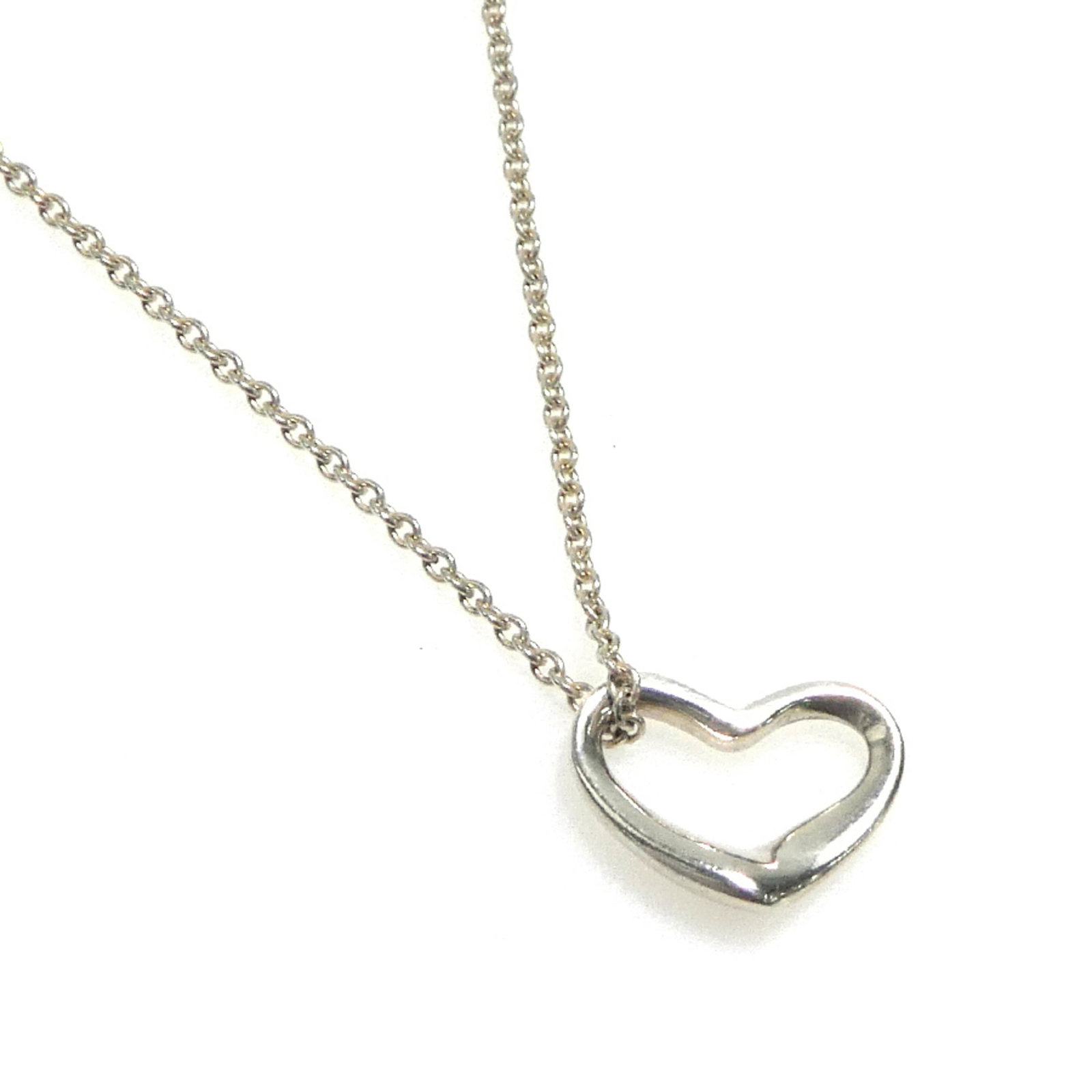 Tiffany & Co. Open Heart Mini Necklace Sterling Silver 925 Women'S 56690A: Tiffany & Co. Open Heart Mini Necklace Sterling Silver 925 Women'S 56690A Sterling silver necklace with an open heart pendant, crafted by Tiffany & Co. in 925 quality. The necklace features a 10mm x 1