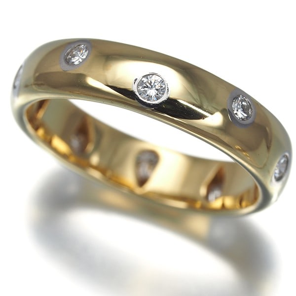 Tiffany&Co. Ring Diamond Dots Us5.25-5.5 18K 750 Yellow Gold/ 950 Platinum: Tiffany&Co. Ring Diamond Dots Us5.25-5.5 18K 750 Yellow Gold/ 950 Platinum Tiffany & Co.'s iconic yellow gold and platinum ring showcases a stunning collection of diamond dots, set against a backdrop