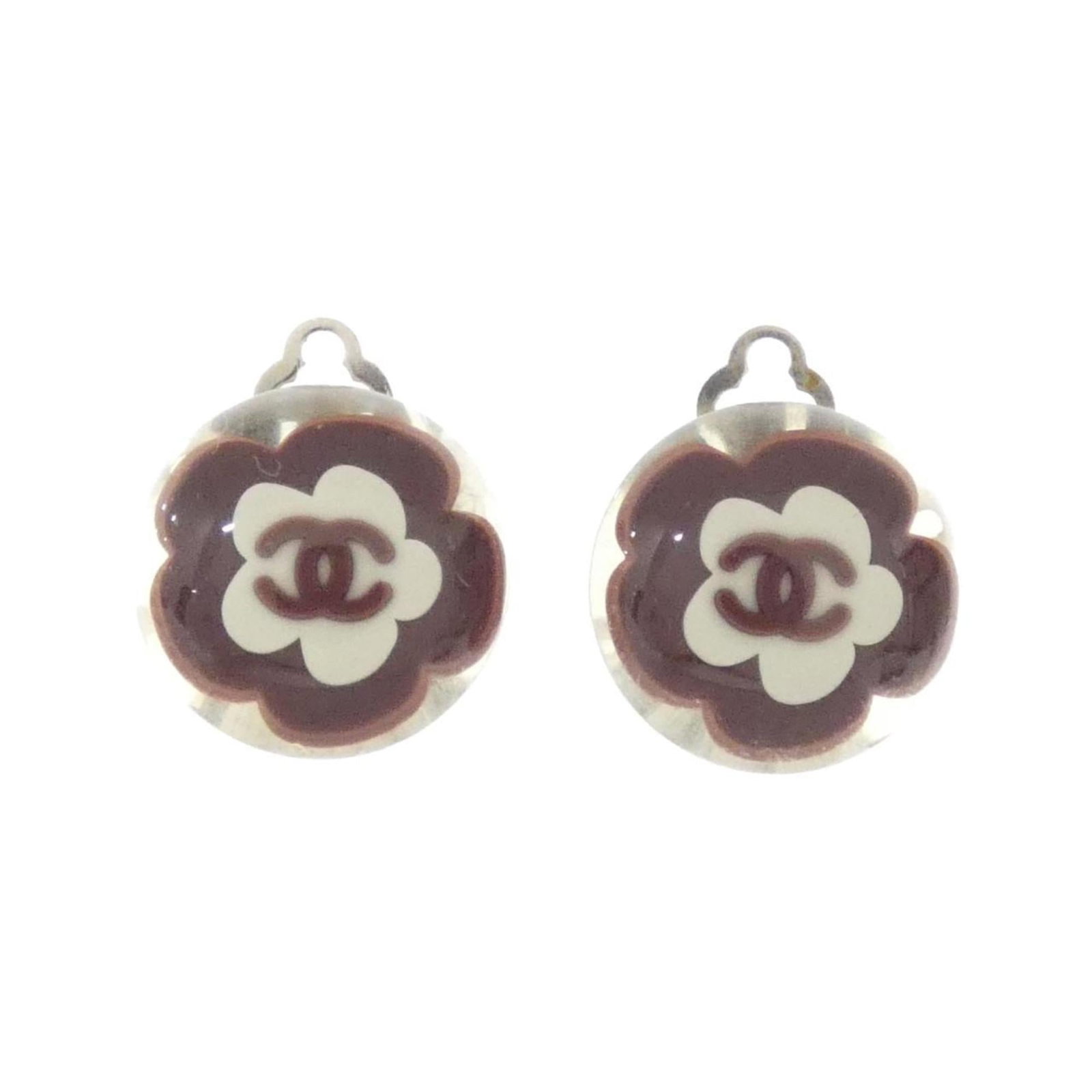 Chanel Clip Earrings: Chanel Clip Earrings Brown, Silver, and White Chanel Clip Earrings with a few traces of usage, some scratches / dirt can be seen but overall in very good condition. Made from durable materials, these 