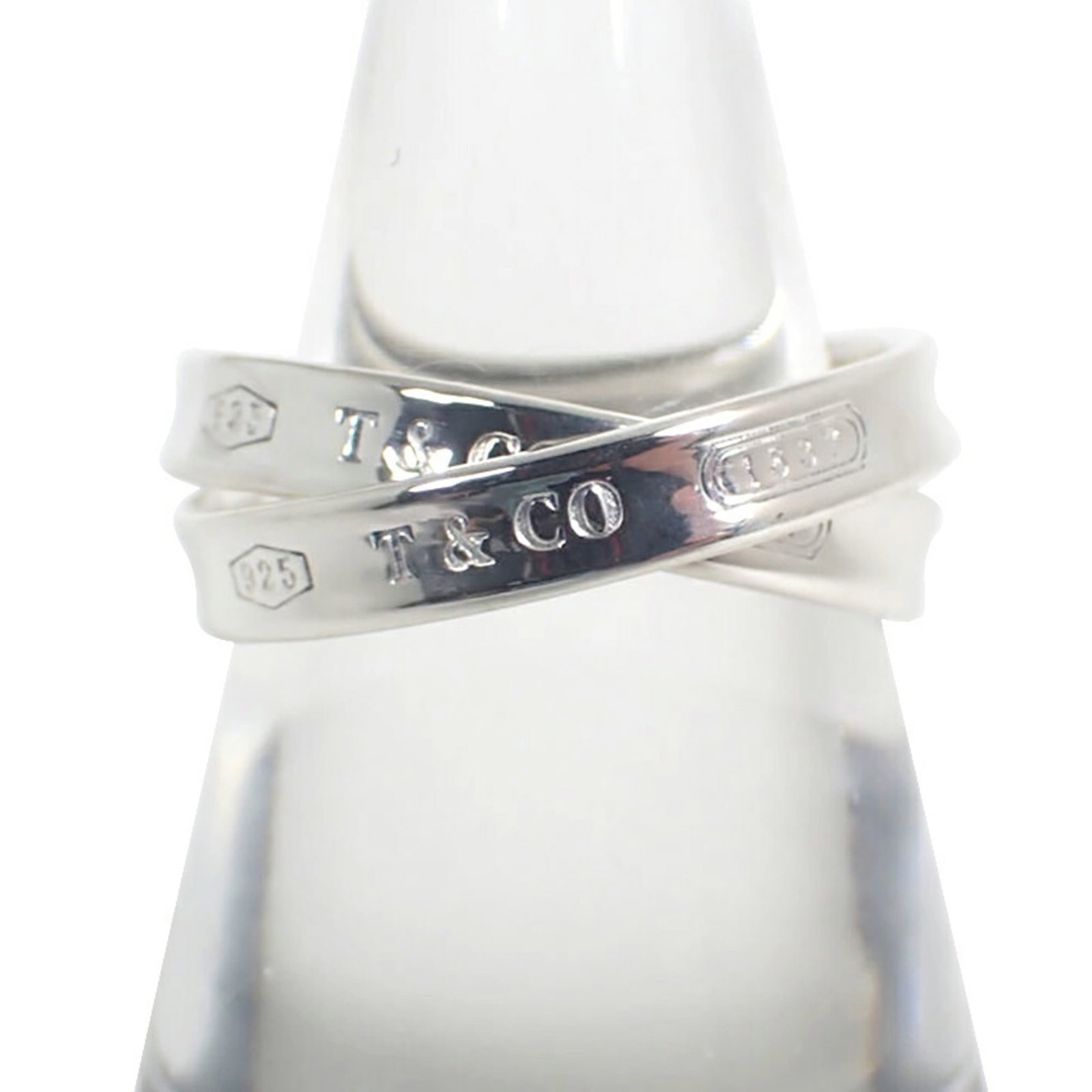 Sterling Silver Ring Tiffany Band: Sterling Silver Ring Tiffany Band Sterling Silver Ring Tiffany Band - A Like New Condition, High-Quality Item. This sterling silver band features the iconic Tiffany brand and is made from durable 925 
