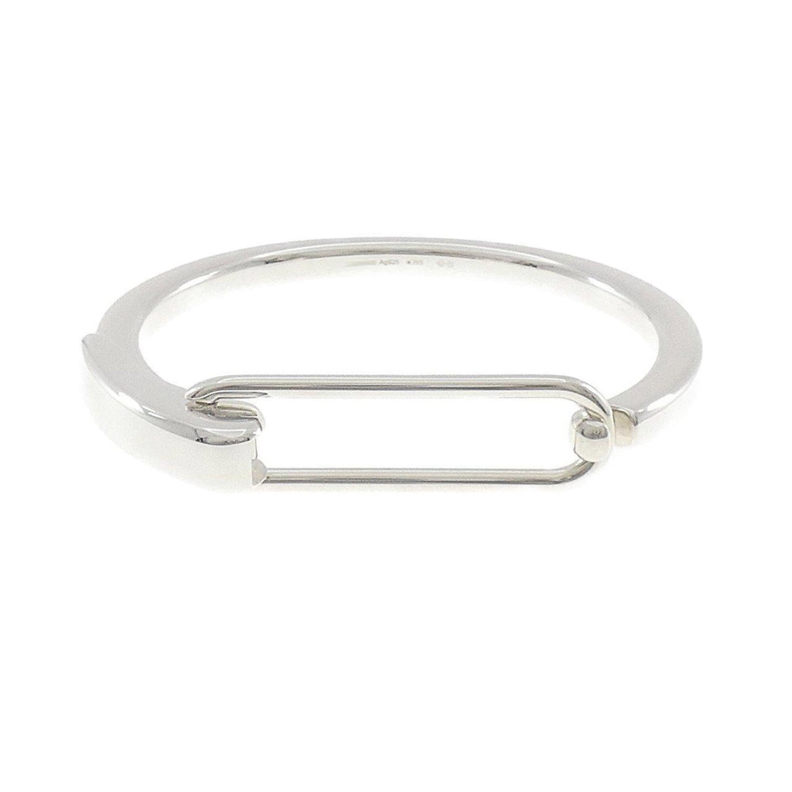 Silver Charm Bracelet 925 by Hermes: Silver Charm Bracelet 925 by Hermes Silver Charm Bracelet 925 by Hermes, featuring a classic design with subtle charm details. This pre-owned bracelet boasts a silver 925 material and measures 16cm in