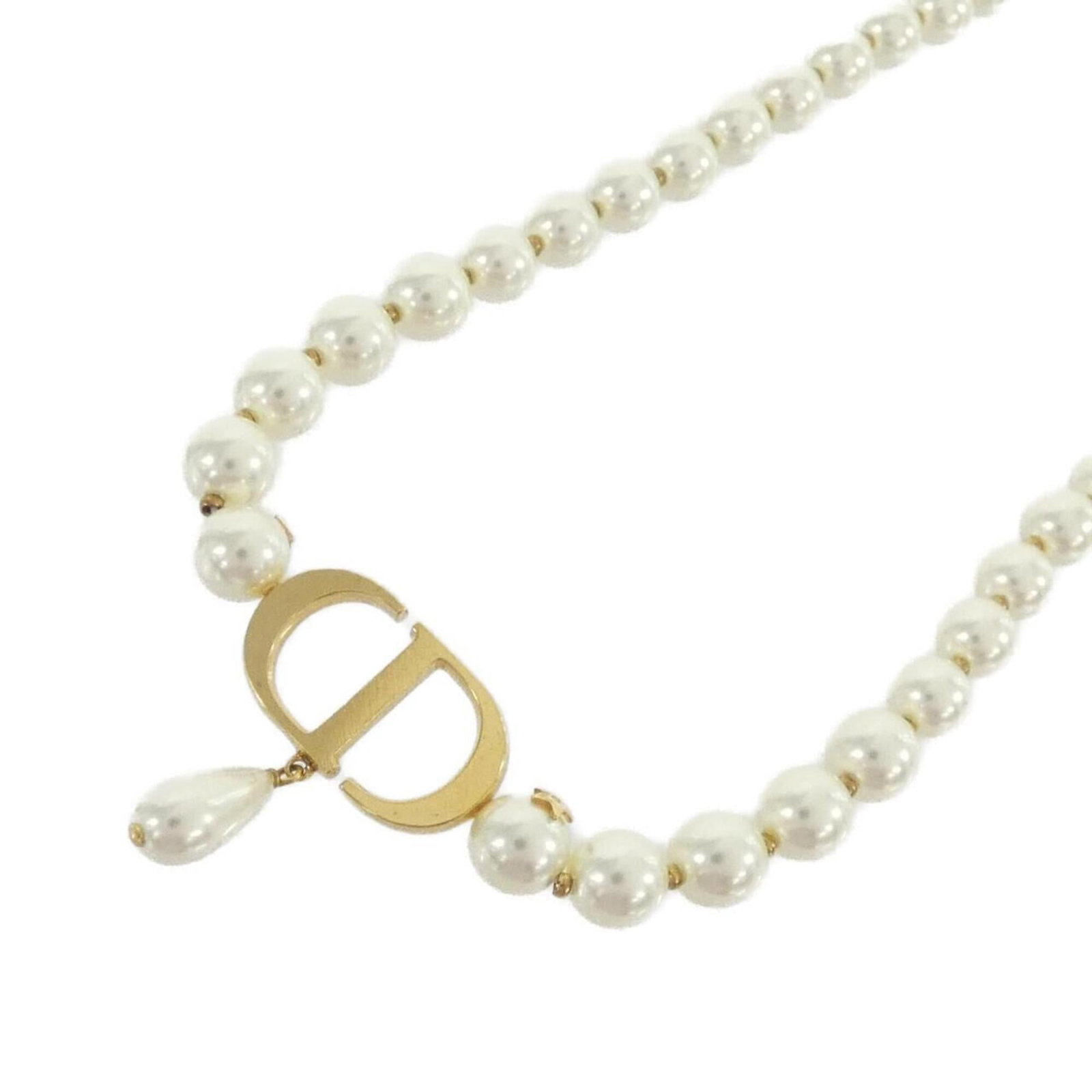 Montaigne Necklace by Christian Dior: Montaigne Necklace by Christian Dior The Montaigne Necklace by Christian Dior boasts a sleek gold and white design, featuring a striking pendant with dimensions of 30mm x 23mm. This elegant necklace f