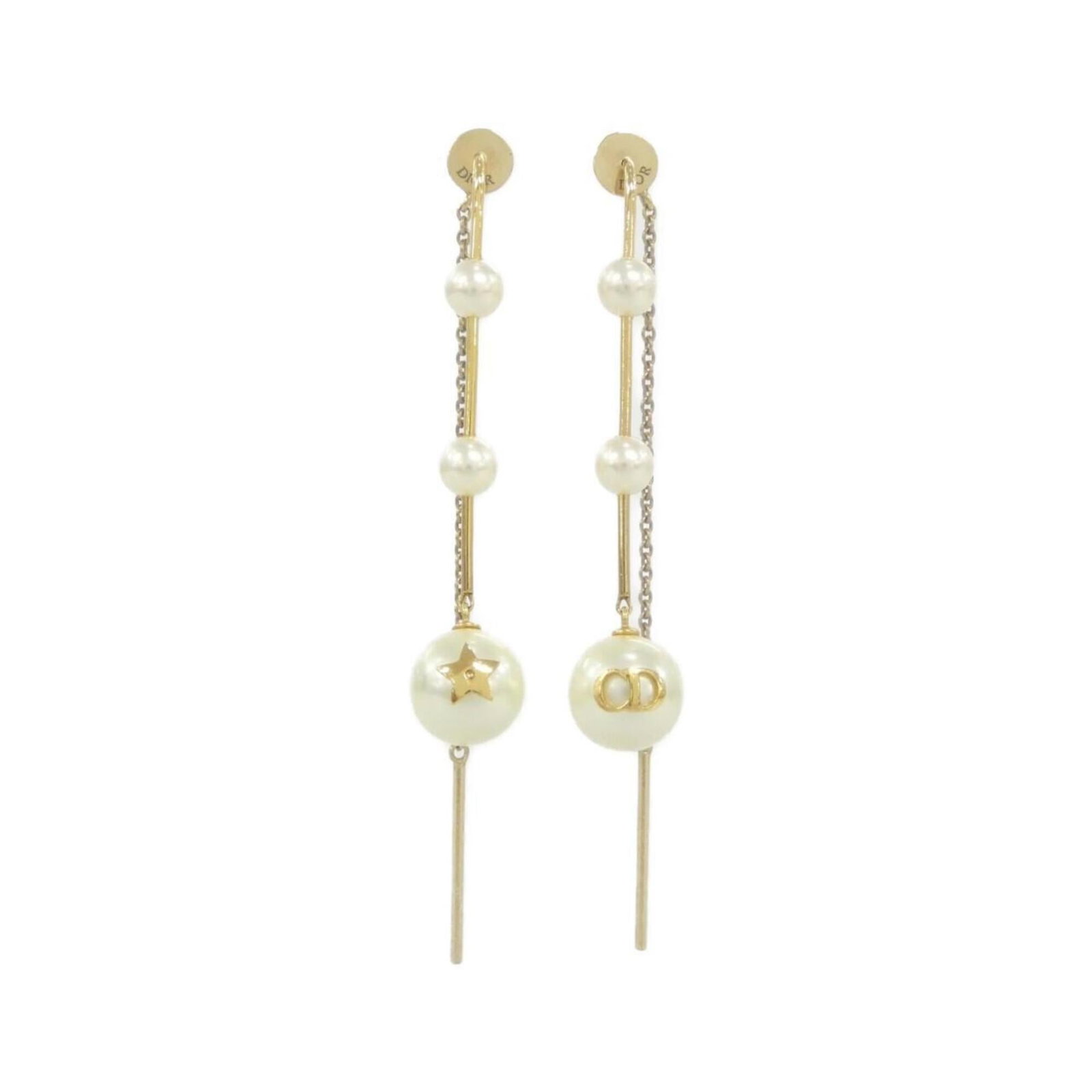 Stud Earrings by Christian Dior: Stud Earrings by Christian Dior Stud earrings by Christian Dior, featuring white metal with subtle scratches and dirt. In very good condition, these earrings showcase the iconic design of the renowned