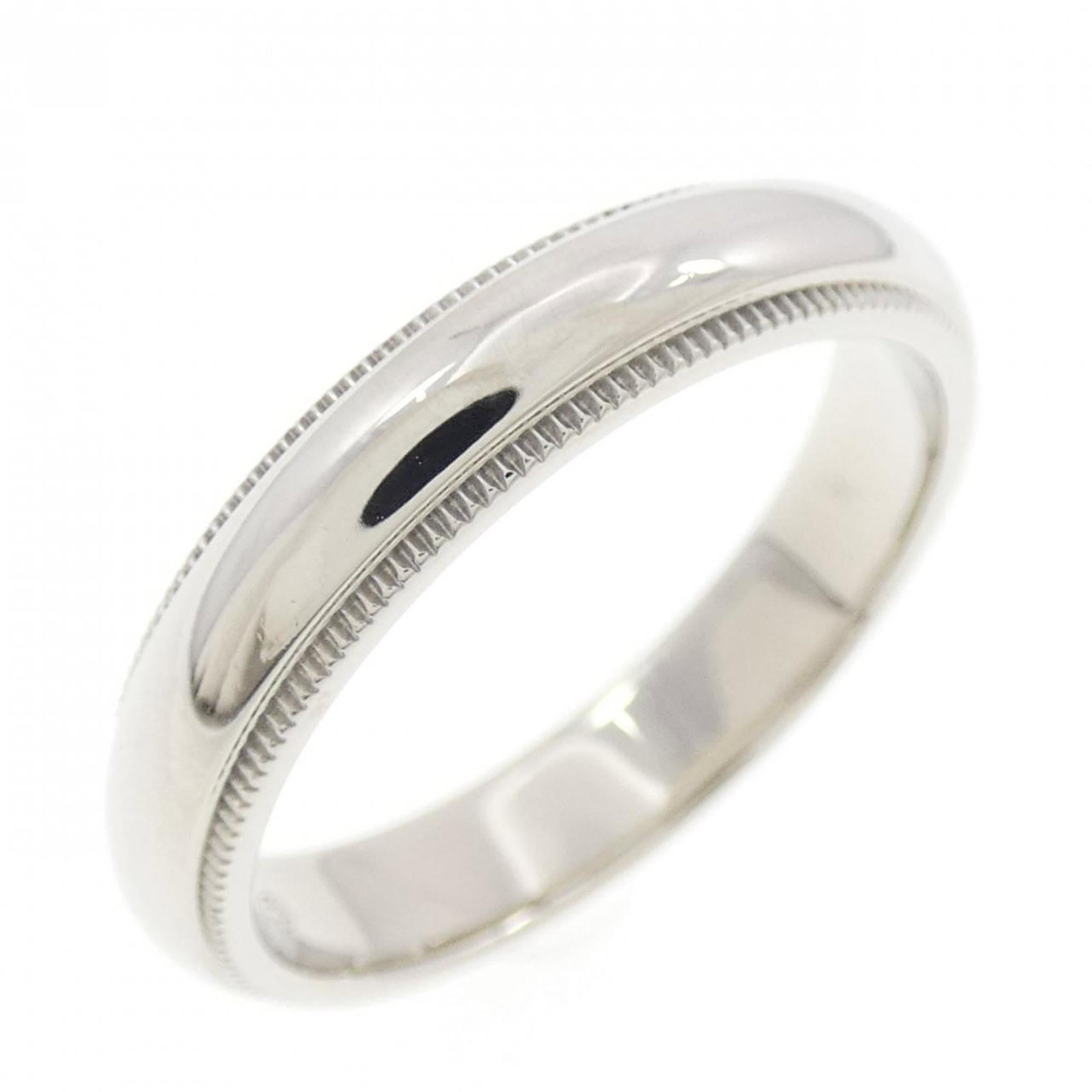 Platinum ring by Tiffany band: Platinum ring by Tiffany band Platinum ring by Tiffany features a band design made from high-quality platinum material. This item has been refurbished to like new condition, with hardly any traces of 