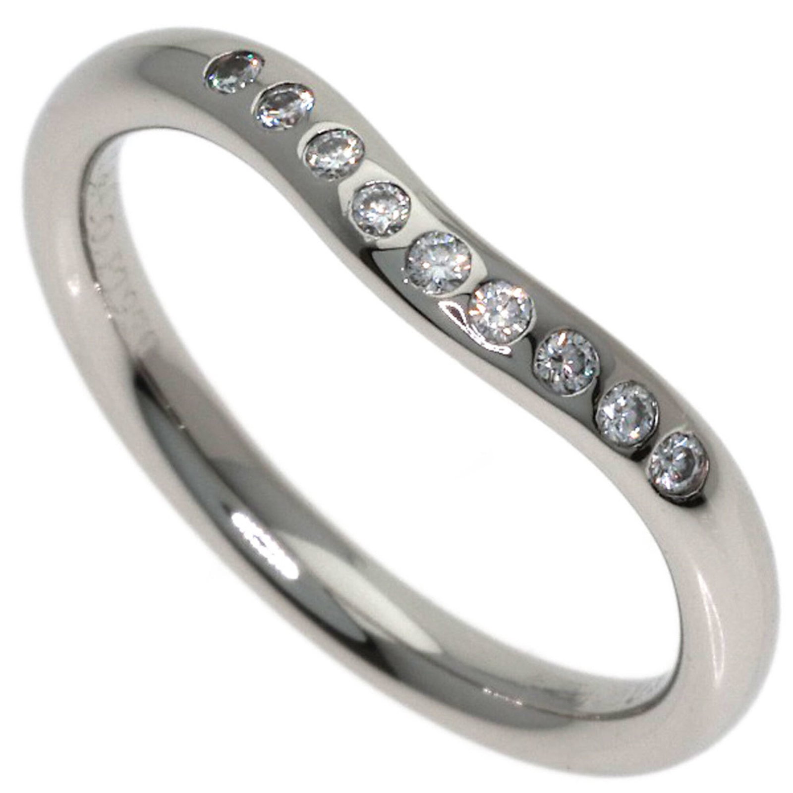 Tiffany Band Ring: Tiffany Band Ring Platinum band ring with a diamond stone, crafted by Tiffany. This 3.5 US size platinum band features a 2mm wide band and weighs approximately 3g. The ring bears a few traces of