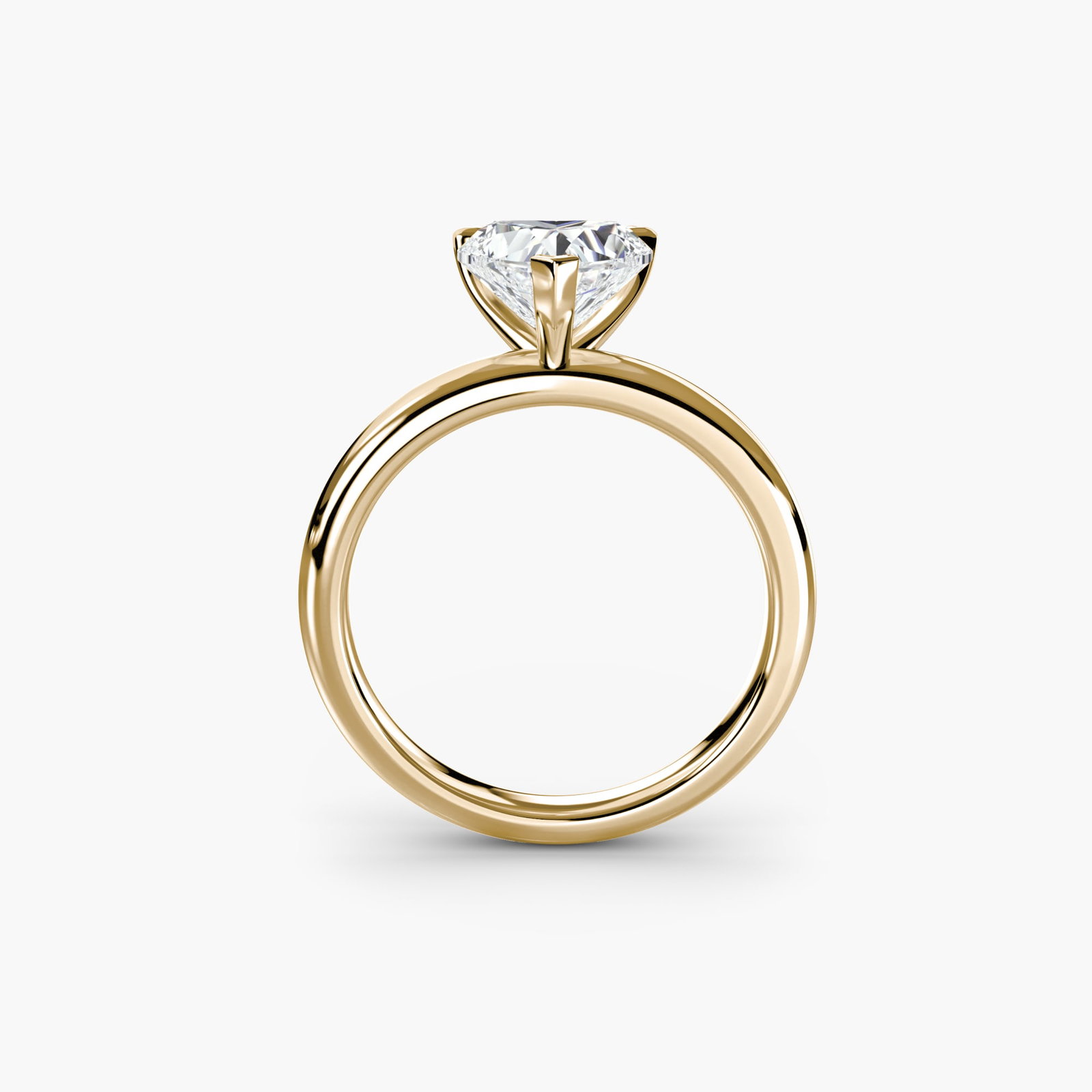 Solitaire Heart 18Kt Yellow Gold Ring Setting: Solitaire Heart 18Kt Yellow Gold Ring Setting 18Kt Yellow Gold Heart Ring Setting for the Perfect Diamond. This stunning ring setting features a sleek heart shape, 2.4mm wide band, and is crafted