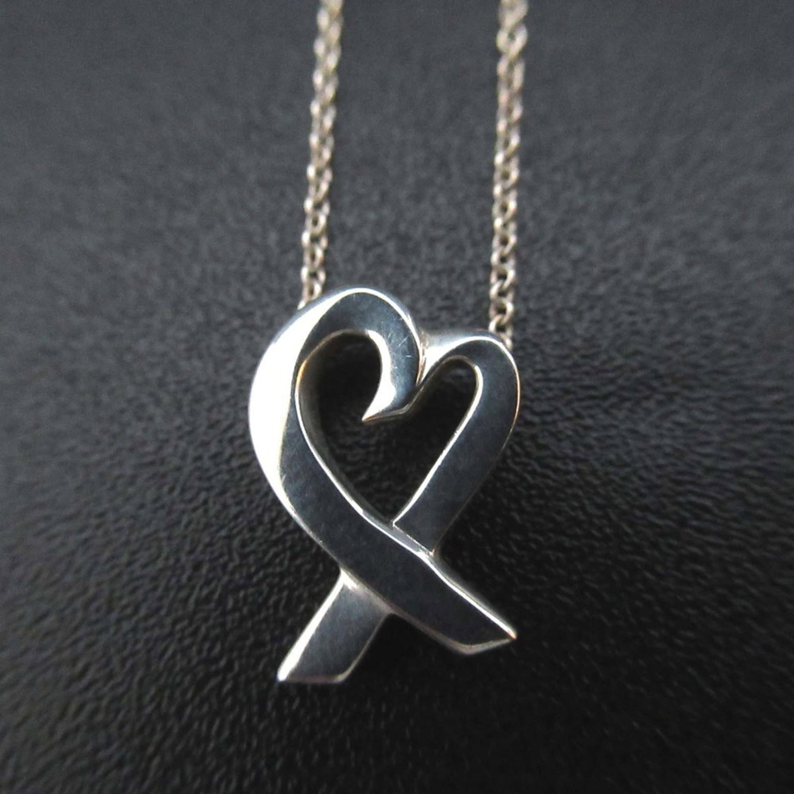 Paloma Picasso Loving Heart Necklace Pendant In 925 Sv Silver For Women: Paloma Picasso Loving Heart Necklace Pendant In 925 Sv Silver For Women Paloma Picasso's iconic Loving Heart Necklace Pendant shines in sterling silver, its delicate design making it a timeless access