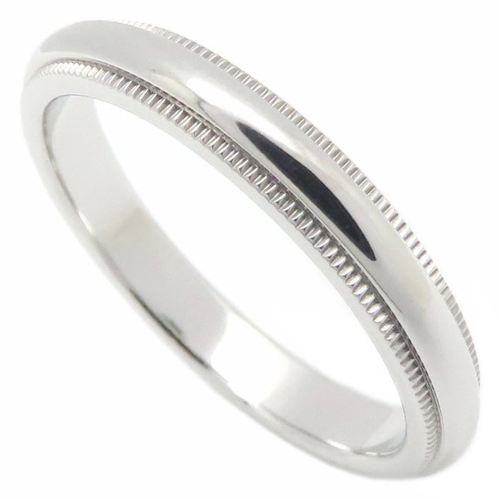 Platinum ring by Tiffany band: Platinum ring by Tiffany band Platinum ring by Tiffany features a high-quality band made from 950 platinum, with a sleek and modern design. This used item has hardly any traces of usage and is in