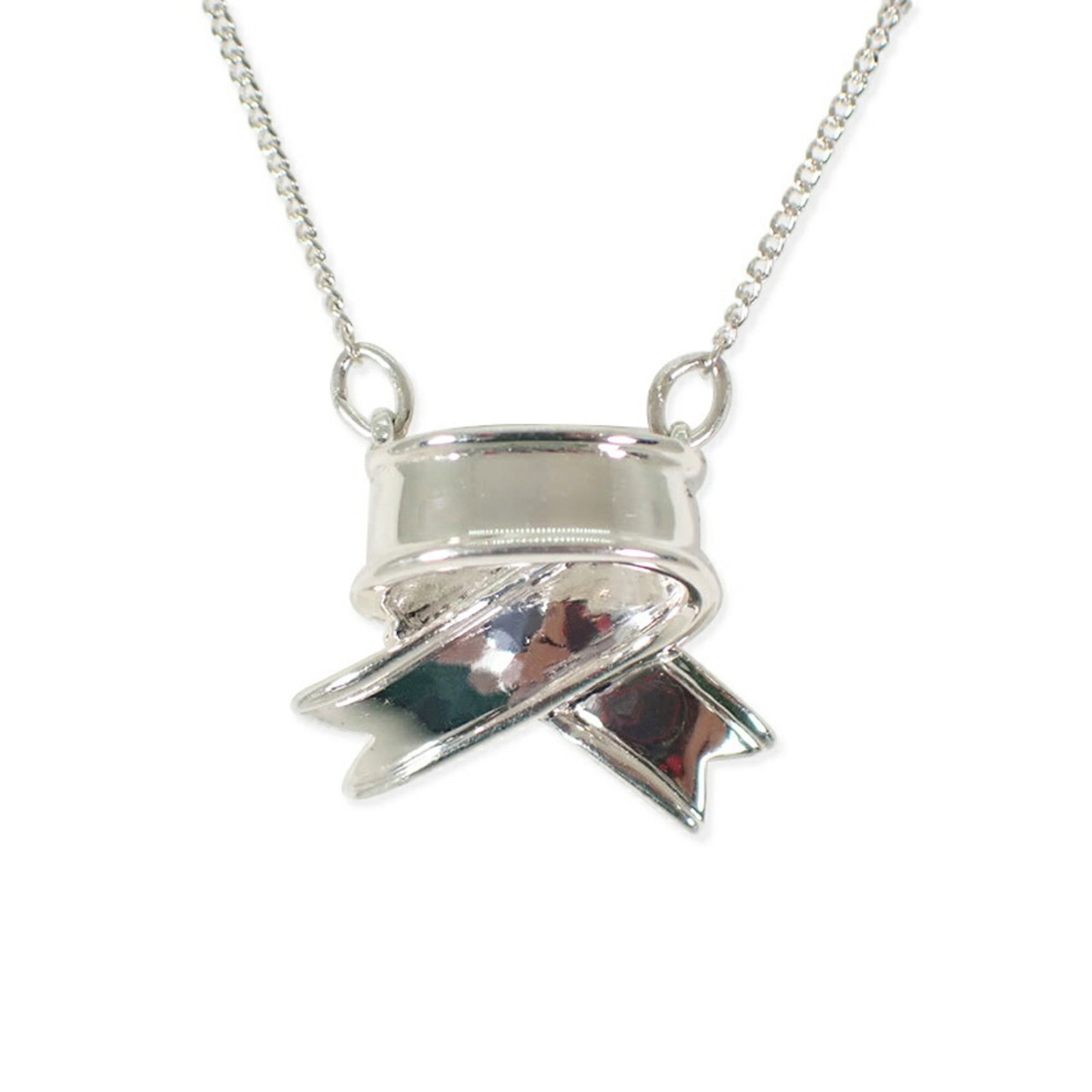 Tiffany 925 ribbon necklace pendant: Tiffany 925 ribbon necklace pendant Sterling silver 925 ribbon necklace pendant, crafted with intricate details and bearing a signature. Made from high-quality sterling silver, this elegant piece feat