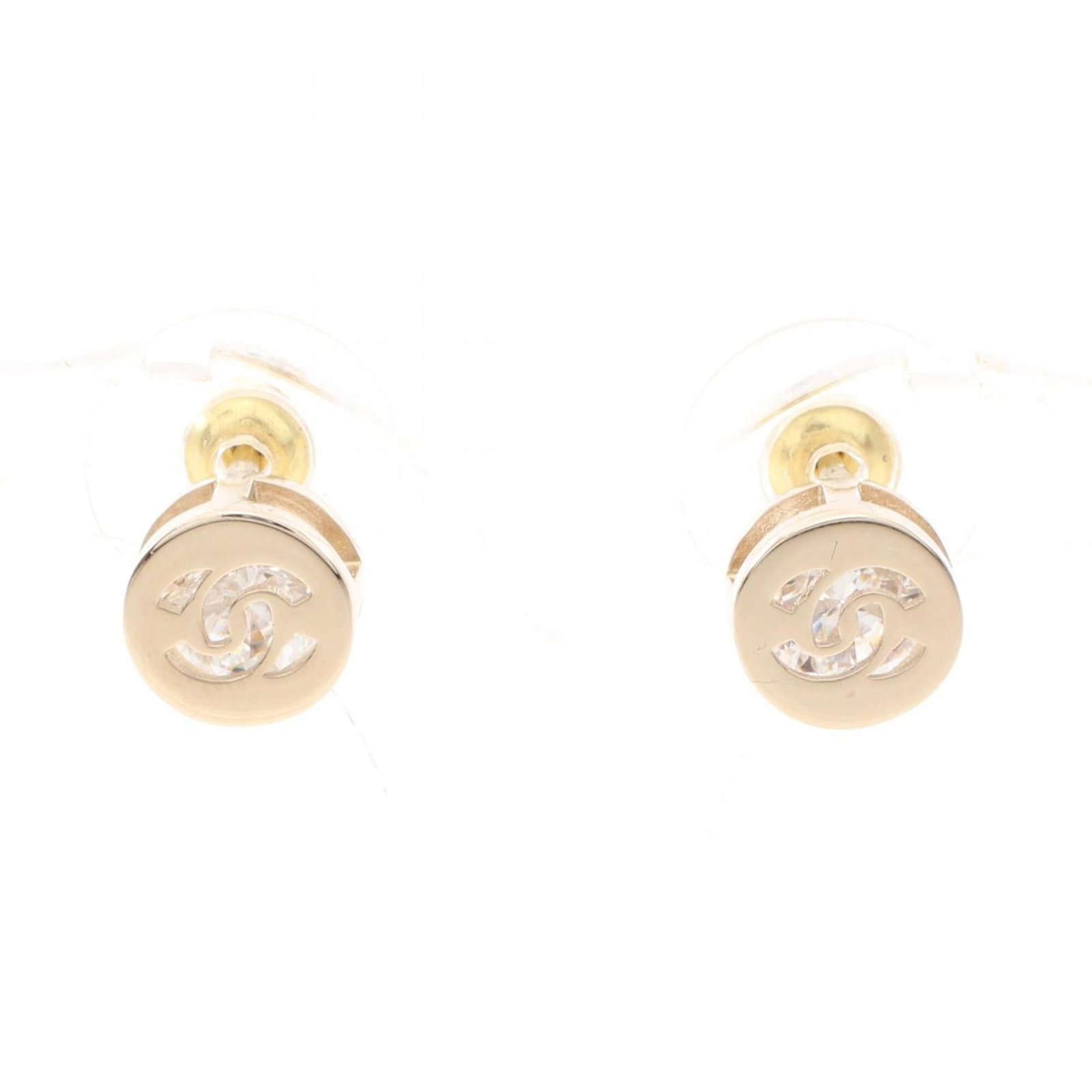 Chanel Stud Earrings: Chanel Stud Earrings Stud earrings from the iconic Chanel brand, featuring gold plating and clear crystal stones. With their sleek design and subtle sparkle, these earrings add a touch of sophisticati