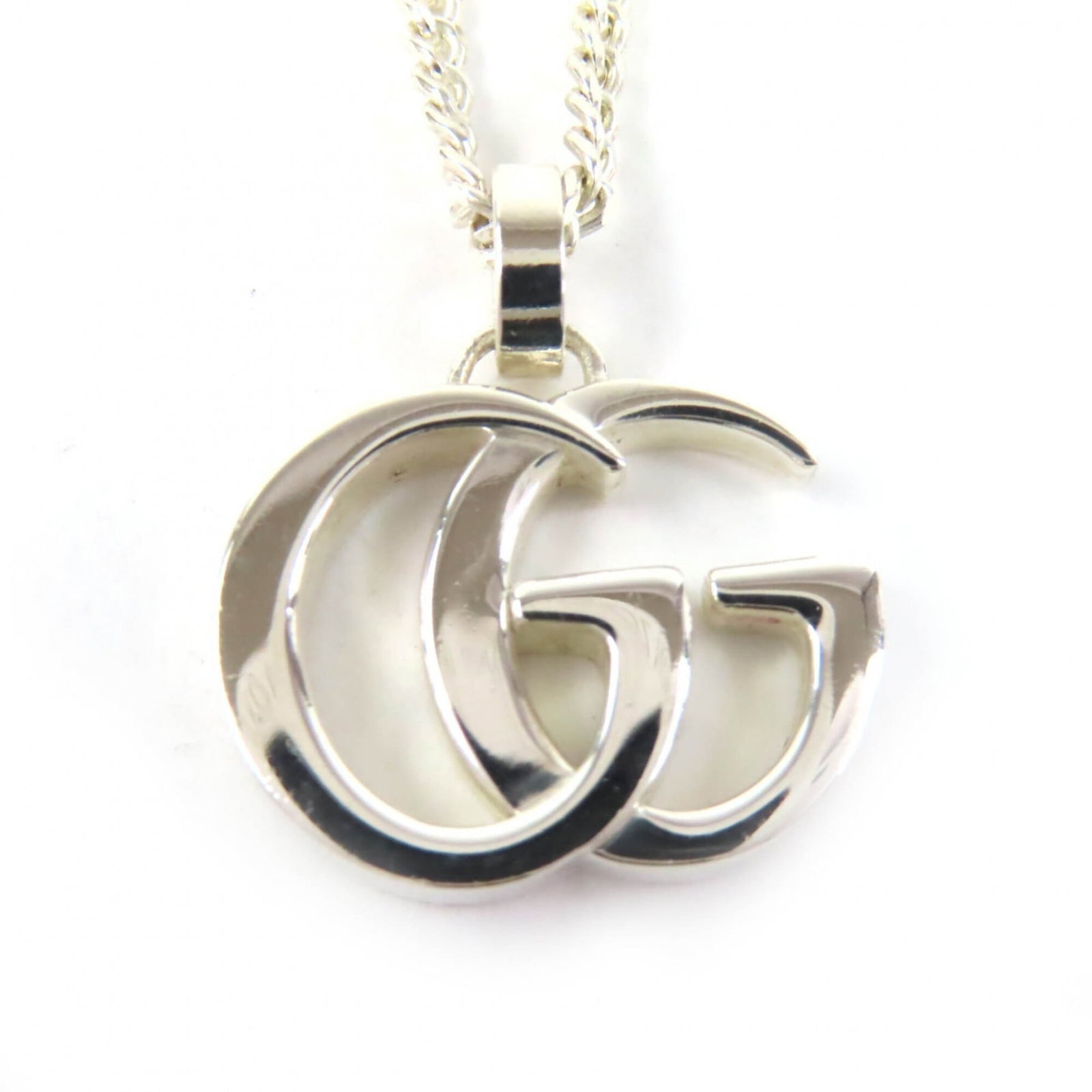 Double G Pendant Necklace 925 Sterling Silver 55Cm With Box Weight 12.3G Recommended Men Women: Double G Pendant Necklace 925 Sterling Silver 55Cm With Box Weight 12.3G Recommended Men Women Sterling silver pendant necklace featuring the iconic Double G logo, crafted from 925 quality metal. Meas