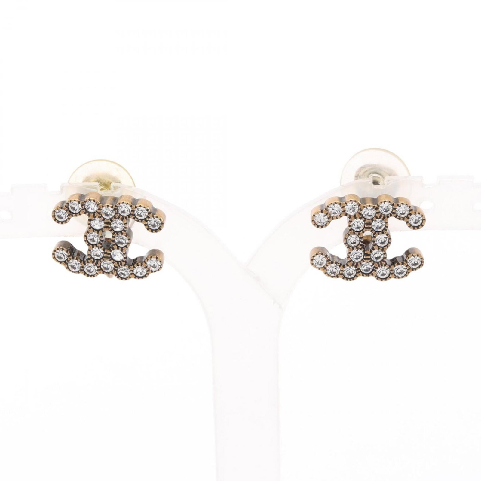 Chanel Clip Earrings Gold Plating Rhinestone: Chanel Clip Earrings Gold Plating Rhinestone Chanel Clip Earrings in Gold Plating with Rhinestones stand out for their elegant design and luxurious touch. Made from gold plating and adorned with clear
