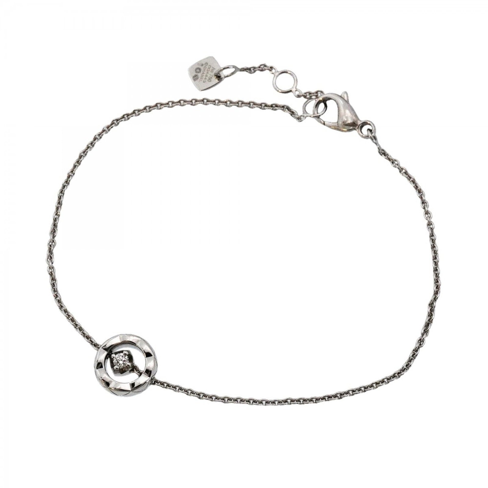 White gold charm bracelet by Chanel: White gold charm bracelet by Chanel White gold charm bracelet by Chanel features a diamond stone and measures 16.5cm in length, showcasing the brand's signature style with a touch of elegance. The 18K