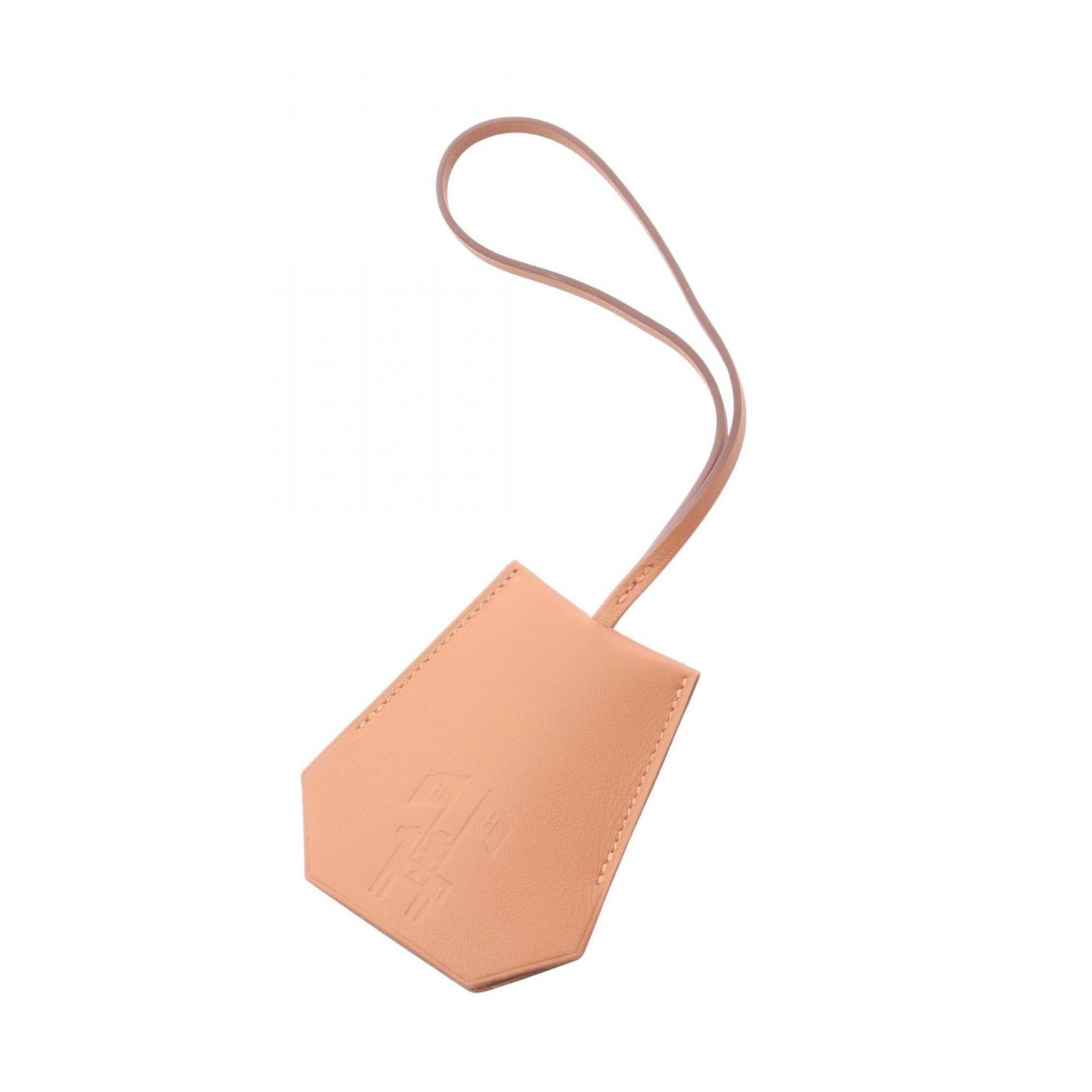 Swift leather handbag charm Hermes: Swift leather handbag charm Hermes Swift leather handbag charm from Hermes, featuring a brown finish with some scratches and dirt. Made from swift leather, this charm has a few traces of usage but
