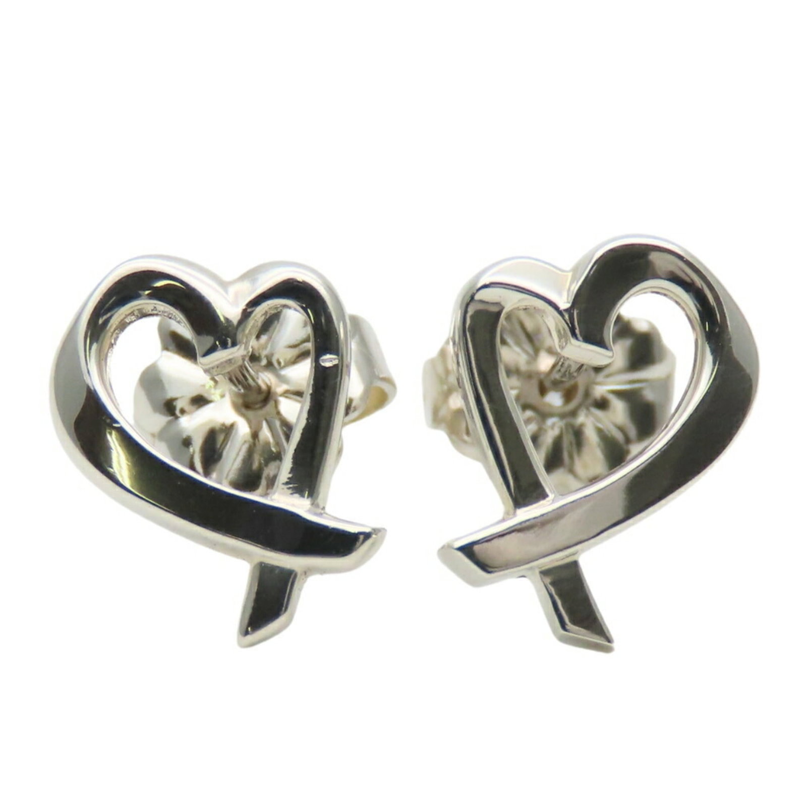 Silver 925 stud earrings by Tiffany: Silver 925 stud earrings by Tiffany Silver 925 stud earrings by Tiffany, bearing the hallmark of high-quality craftsmanship, feature a sleek and sophisticated design. Made from sterling silver with a