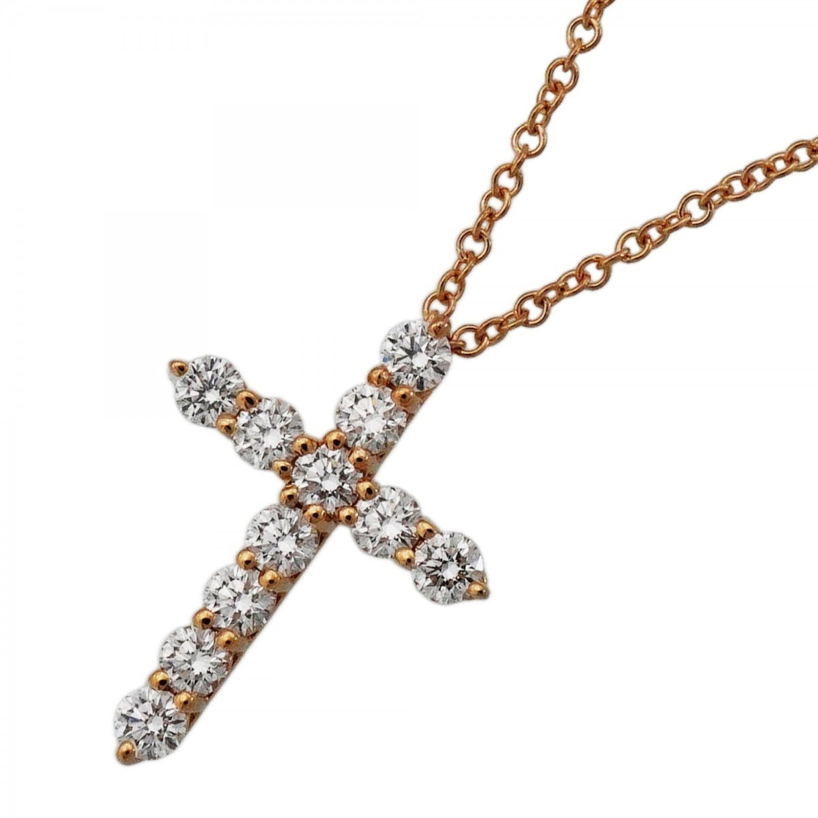 Small cross necklace 18k pink gold ladies with diamonds from Tiffany: Small cross necklace 18k pink gold ladies with diamonds from Tiffany Small cross necklace in 18k pink gold with diamonds from Tiffany, featuring a 17.5mm x 12.8mm pendant and adjustable 40.5cm chain