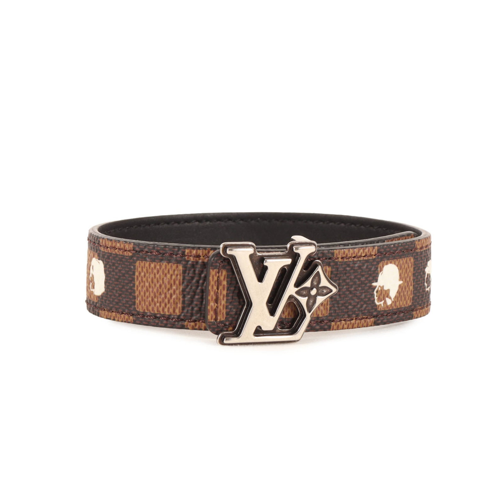Canvas leather bracelet by Louis Vuitton: Canvas leather bracelet by Louis Vuitton Canvas leather bracelet by Louis Vuitton, featuring Damier canvas in black and brown hues. This versatile charm bracelet boasts a sleek design with a subtle te